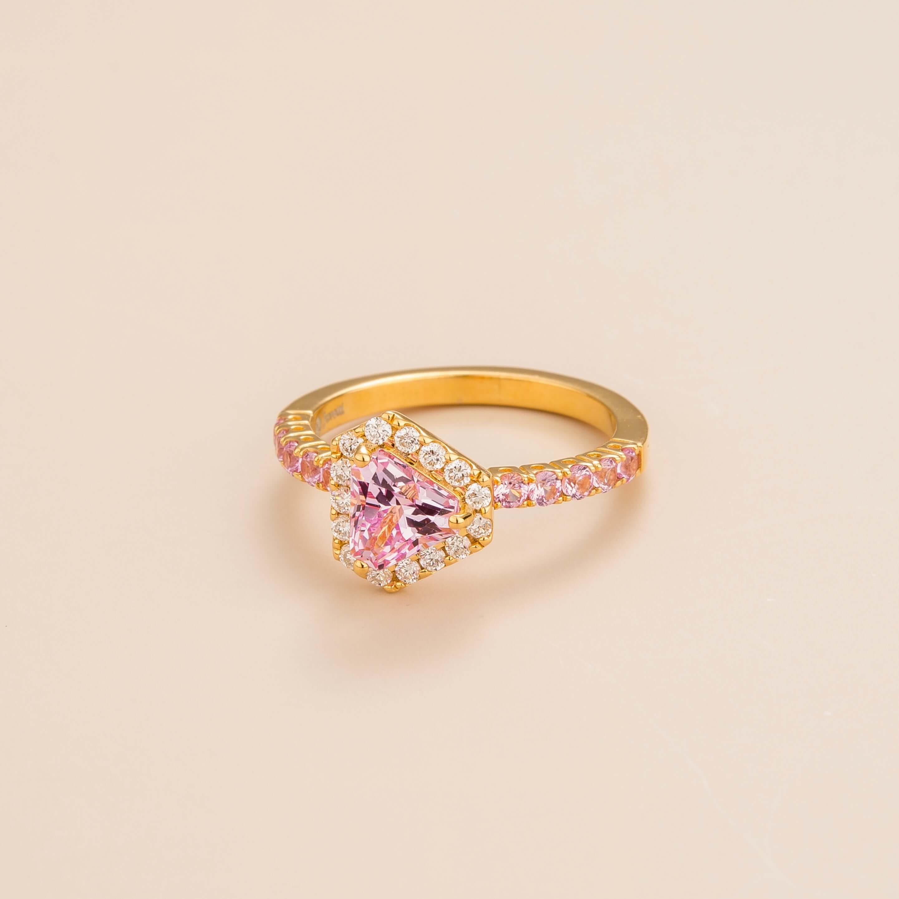 Diana ring in 18K gold vermeil set with lab grown diamond and triangle pink sapphire gem stones.