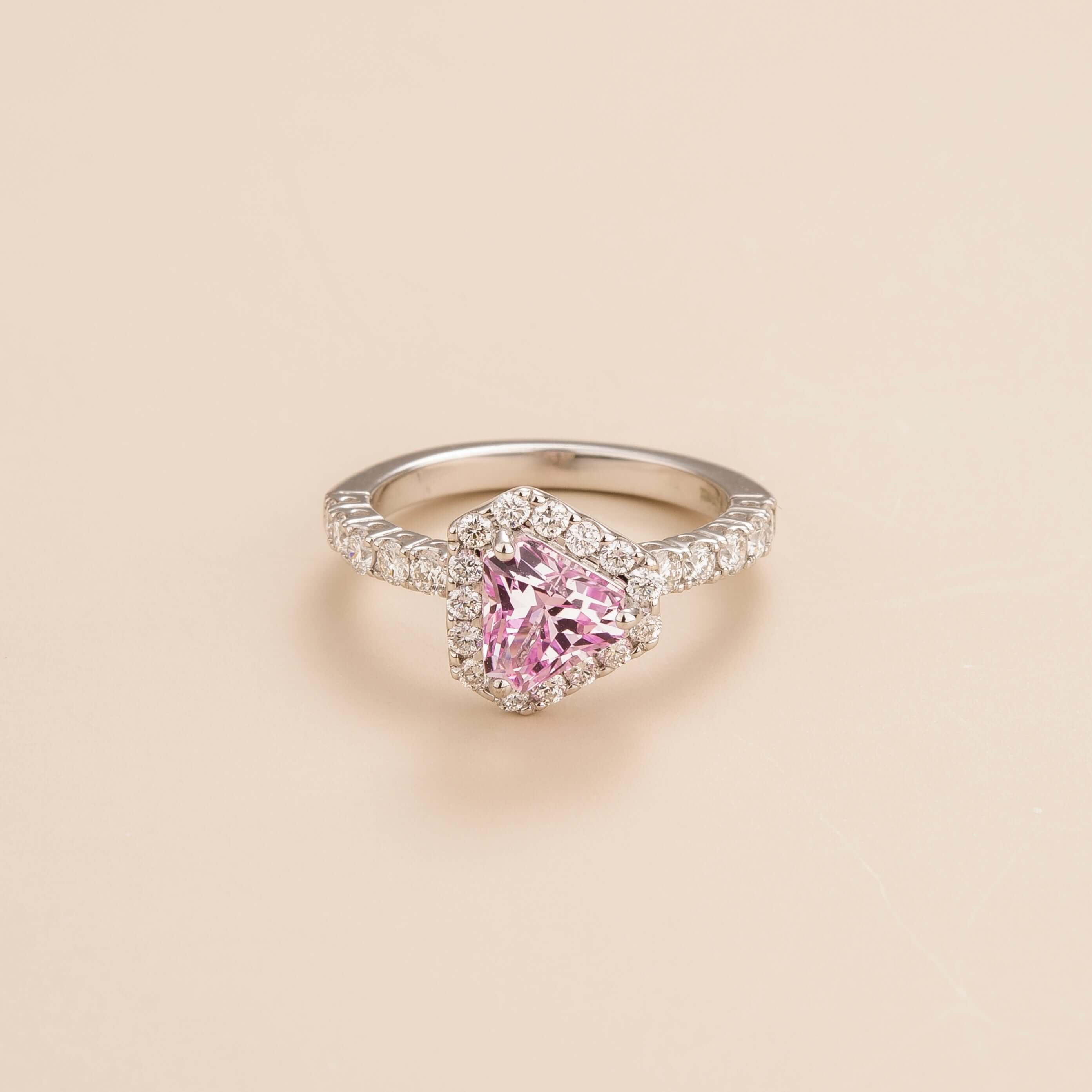 Diana ring in 18K white gold vermeil set with lab grown diamond and triangle pink sapphire gem stones. Perfect for yourself and as gift.