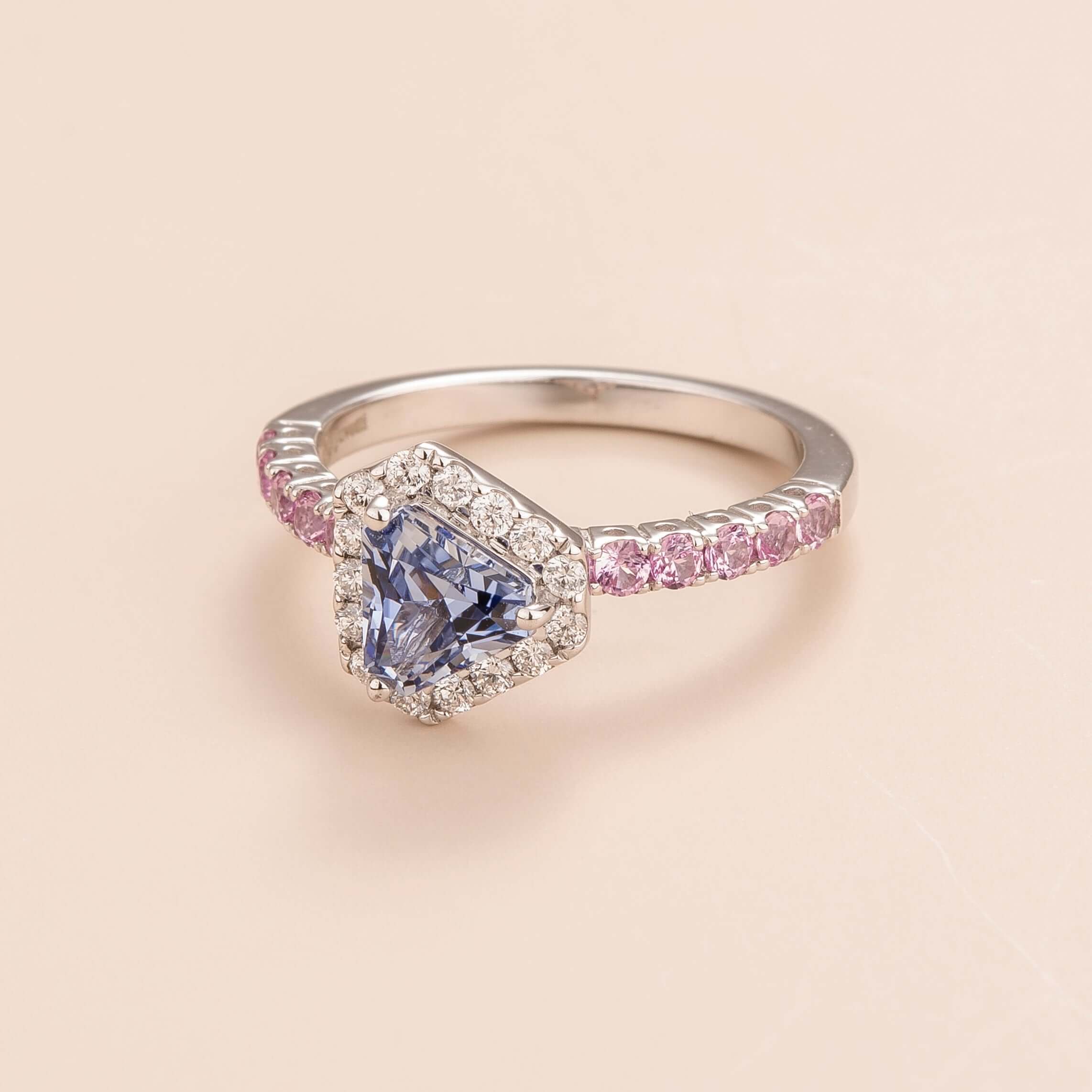 Triangle-cut Blue Sapphire & Diamond Halo Stud Earrings in White Gold – front view