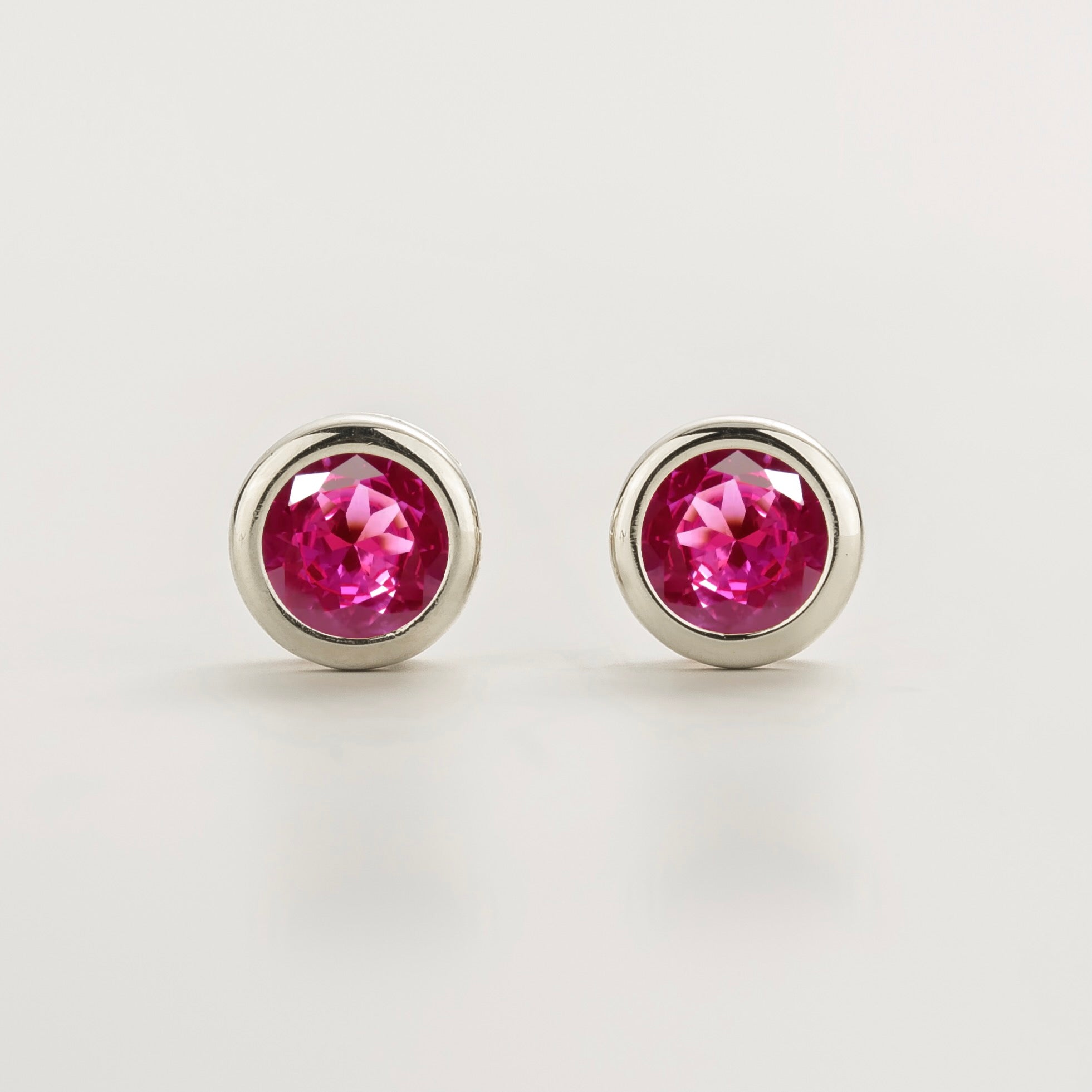 Margo Vivid Pink Sapphire Round Bazel Set White Gold Earrings