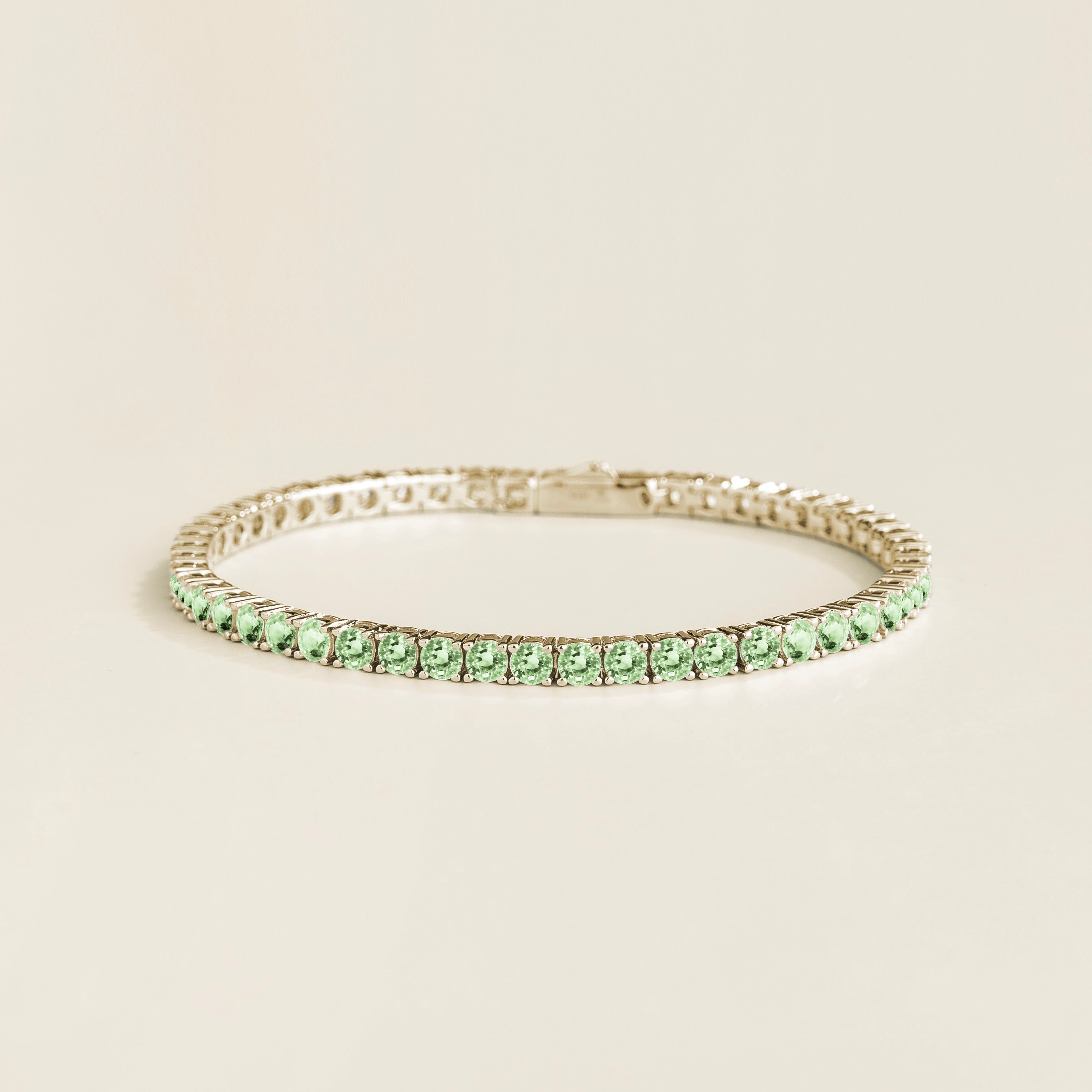 Ciclo Green Sapphire Round Tennis Bracelet in White Gold