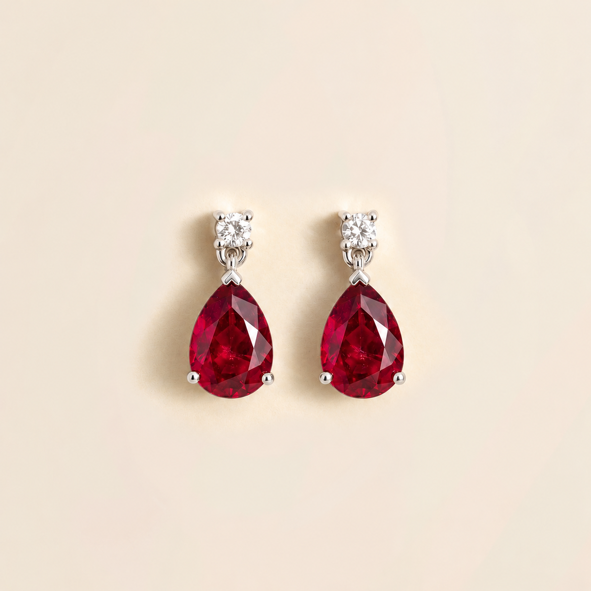 Pisa Ruby & Diamond Pear Drop Earrings in White Gold
