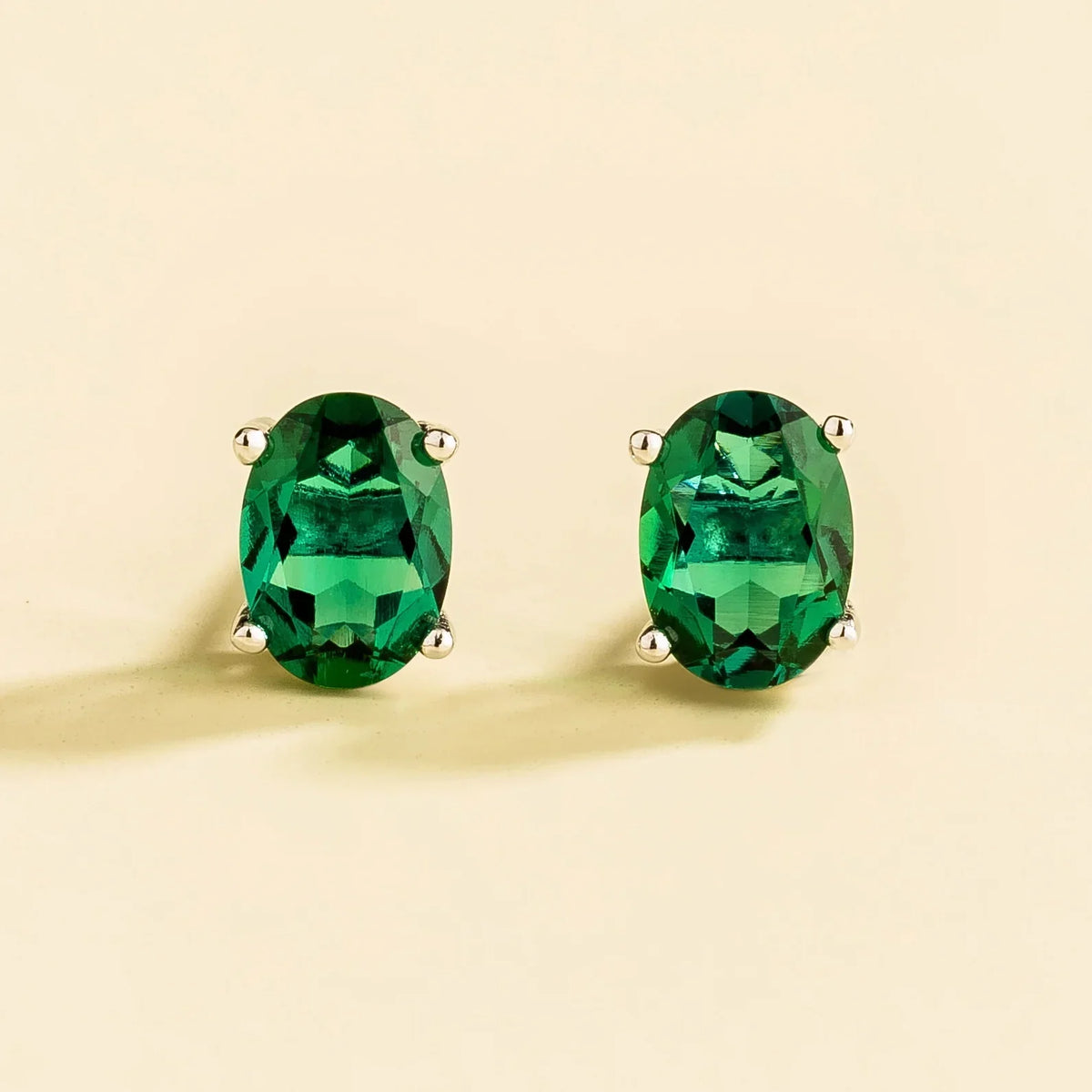 Ova Emerald Earrings in White Gold