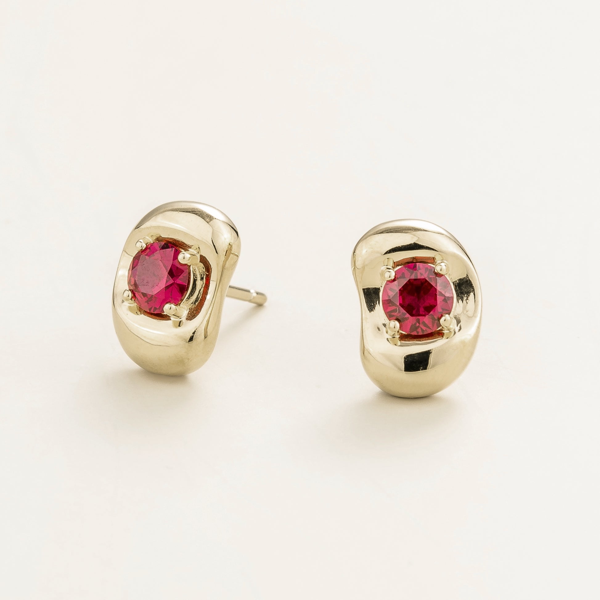 Fava White Gold Earrings Set With Ruby London Jewellery