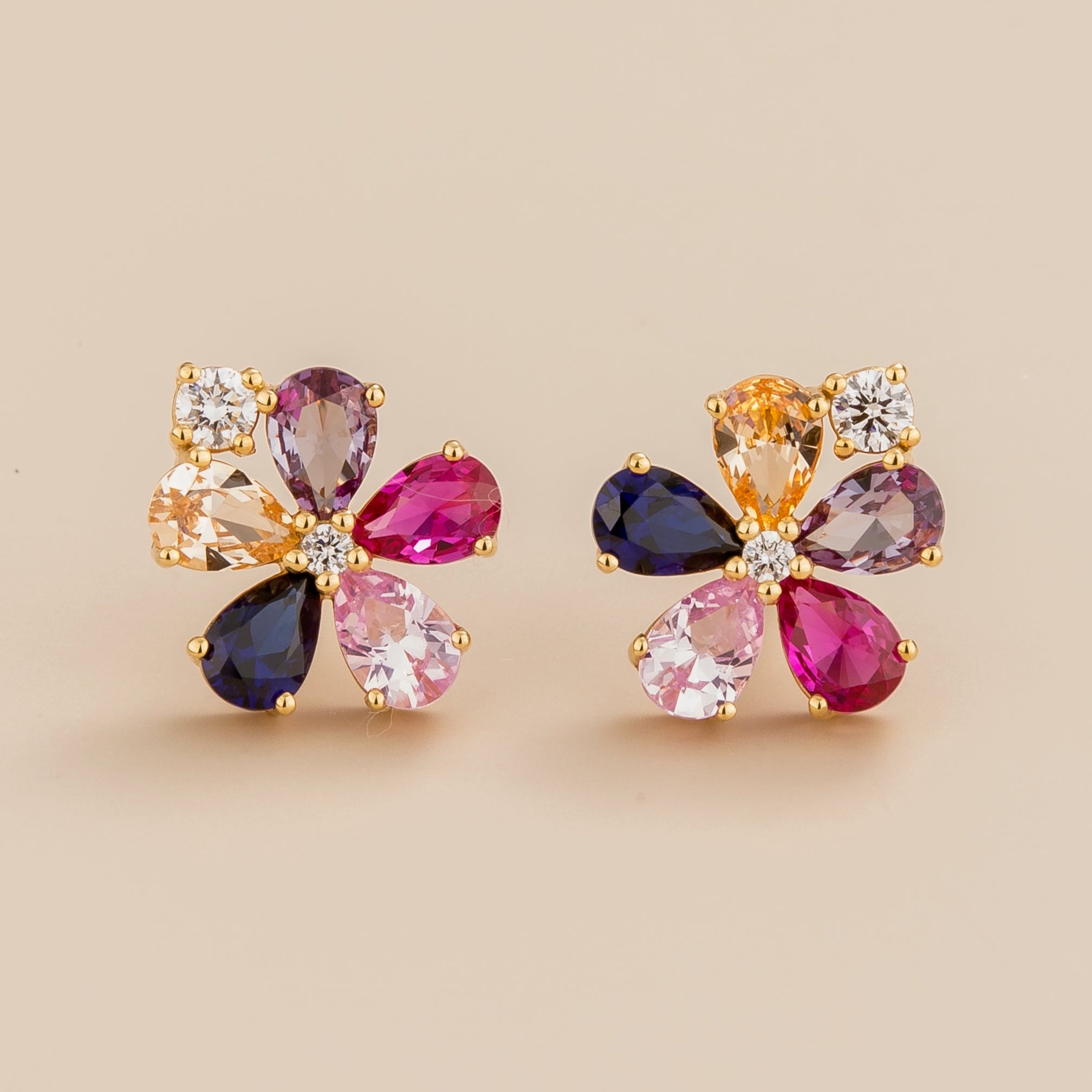 Florea flower floral earrings in 18K gold vermeil set with Diamonds, Blue sapphire, Pink sapphire and Champagne sapphire. Perfect for yourself and as gift.