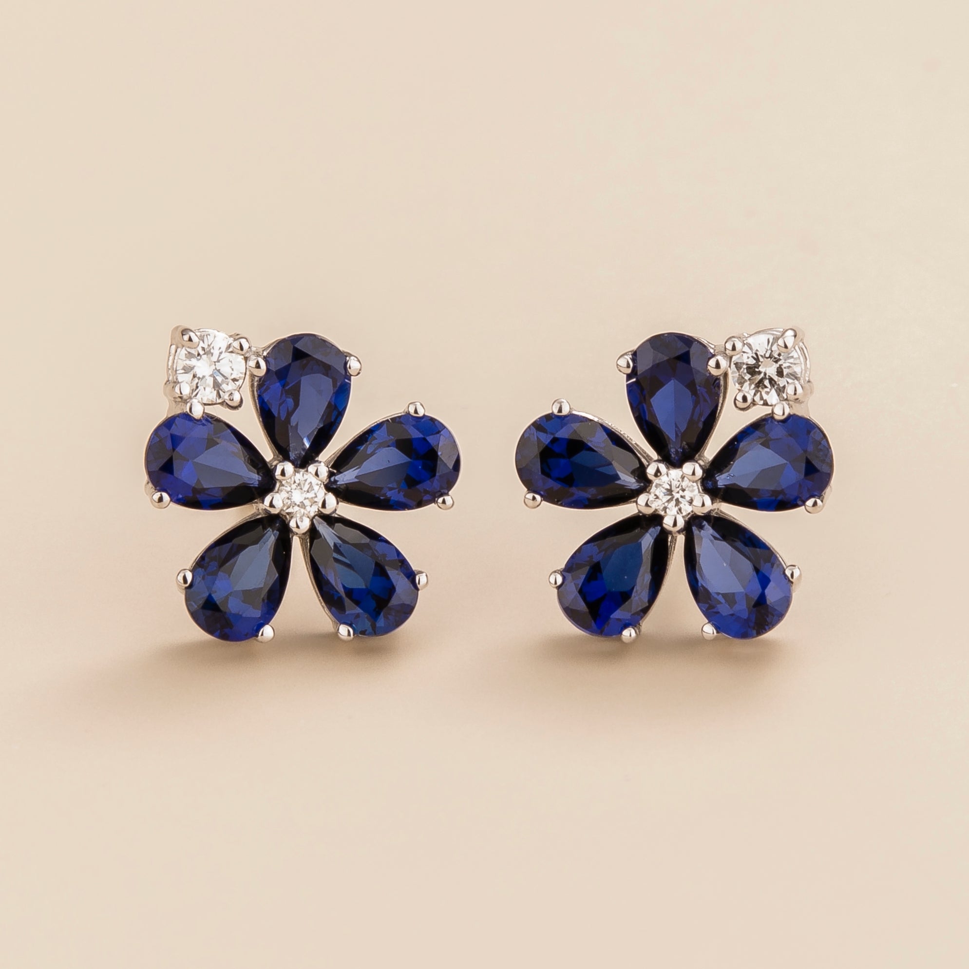 Florea flower floral earrings in 18K white gold vermeil set with lab grown diamond and blue sapphire. Perfect for yourself and as gift.