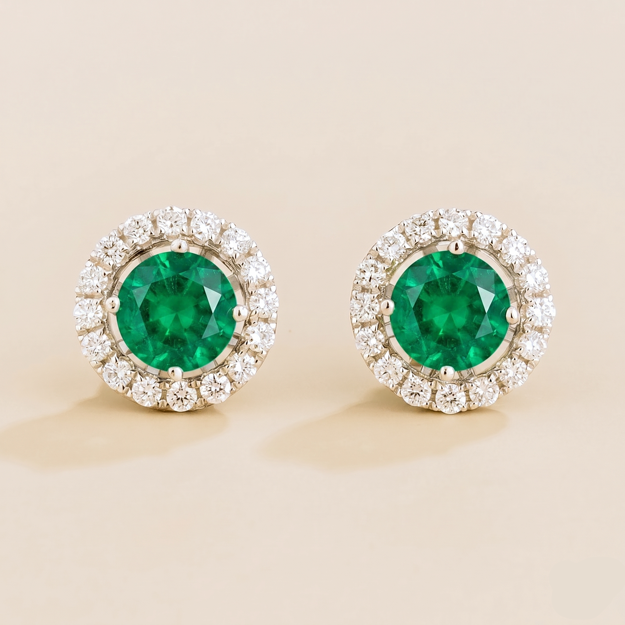 Round lab-grown emerald and diamond halo stud earrings, Floret design in white gold | Juvetti London