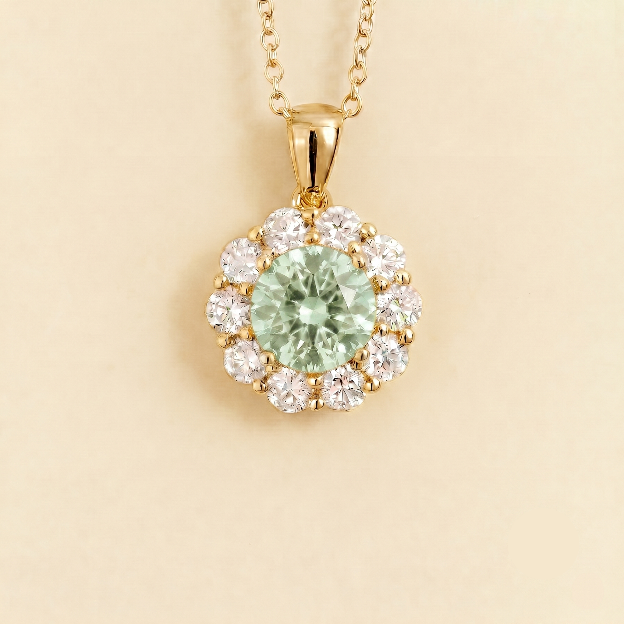 Round lab-grown green sapphire and diamond halo pendant necklace, Floret design in gold | Juvetti London
