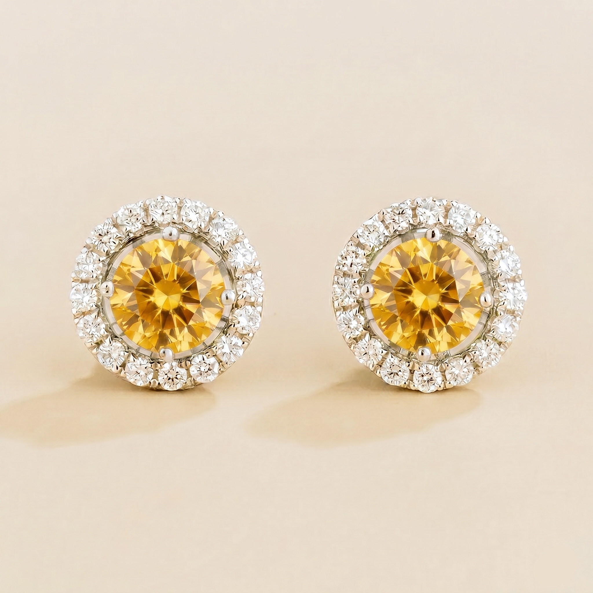 Round lab-grown yellow sapphire and diamond halo stud earrings, Floret design in white gold | Juvetti London