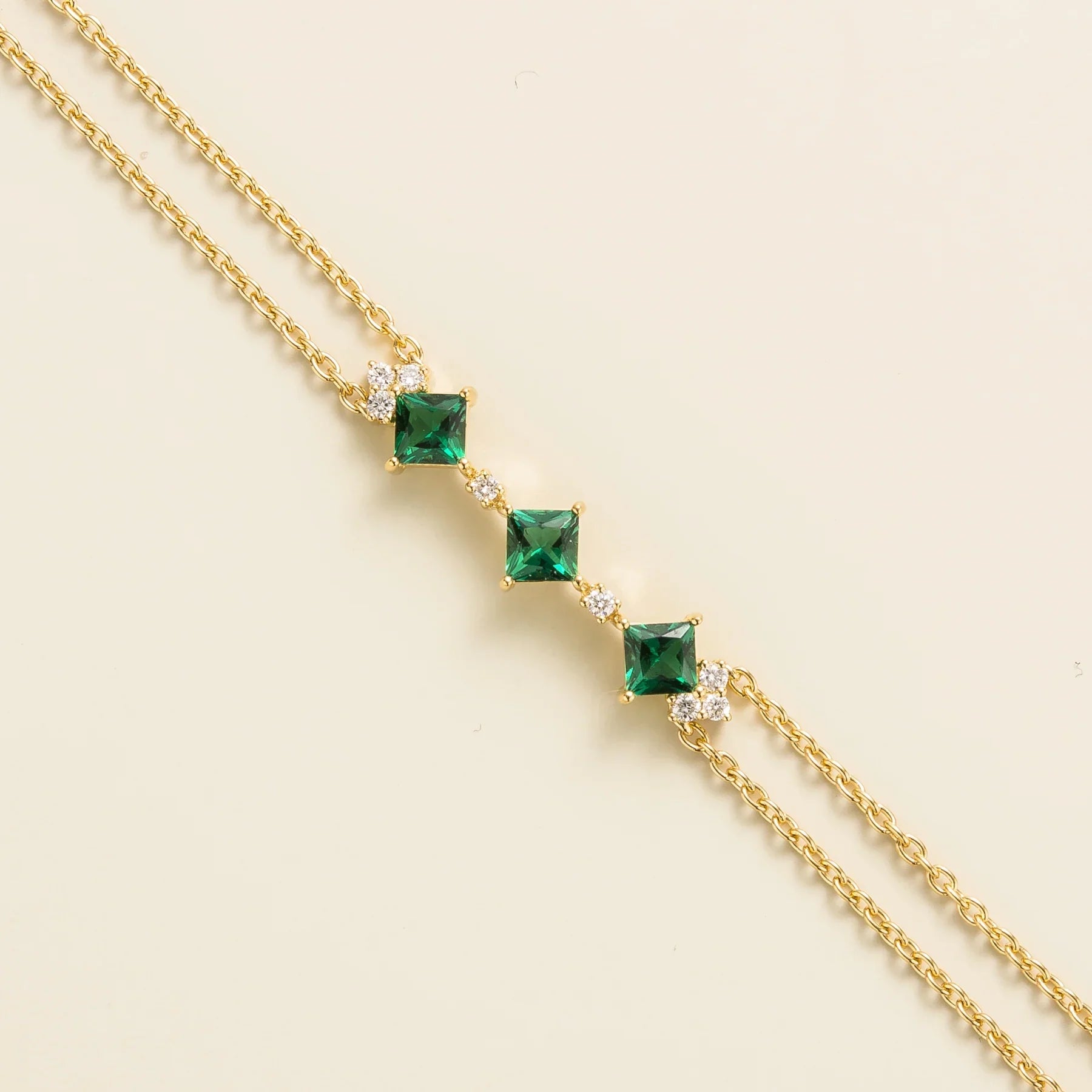 Forma Emerald Princess Cut & Diamond Station Bracelet in Gold