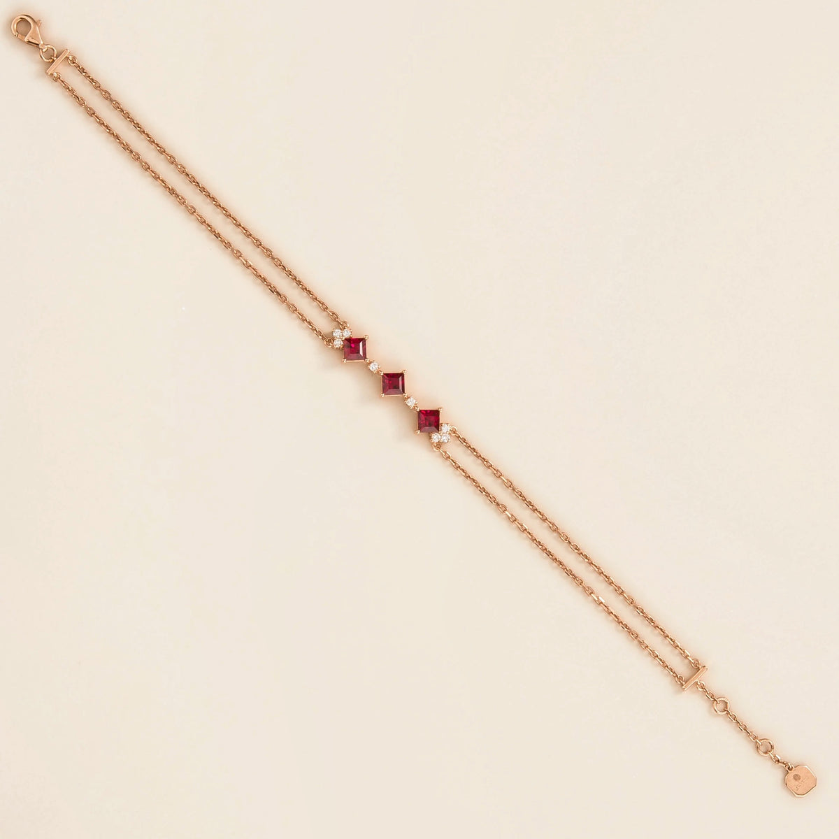 Forma bracelet in 18K pink gold vermeil set with lab grown diamond and ruby. Perfect for yourself and as gift.