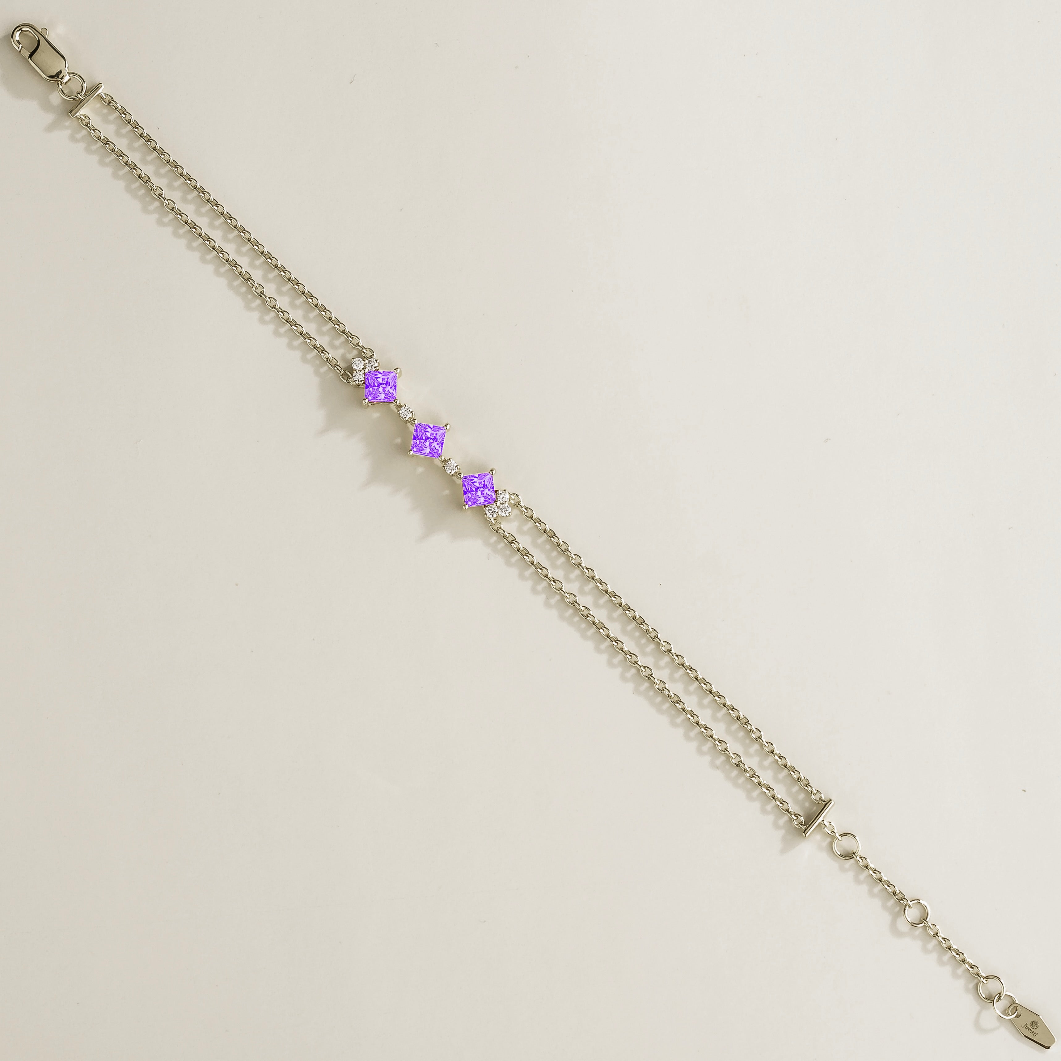 forma white gold bracelet with purple sapphires and lab grown diamonds