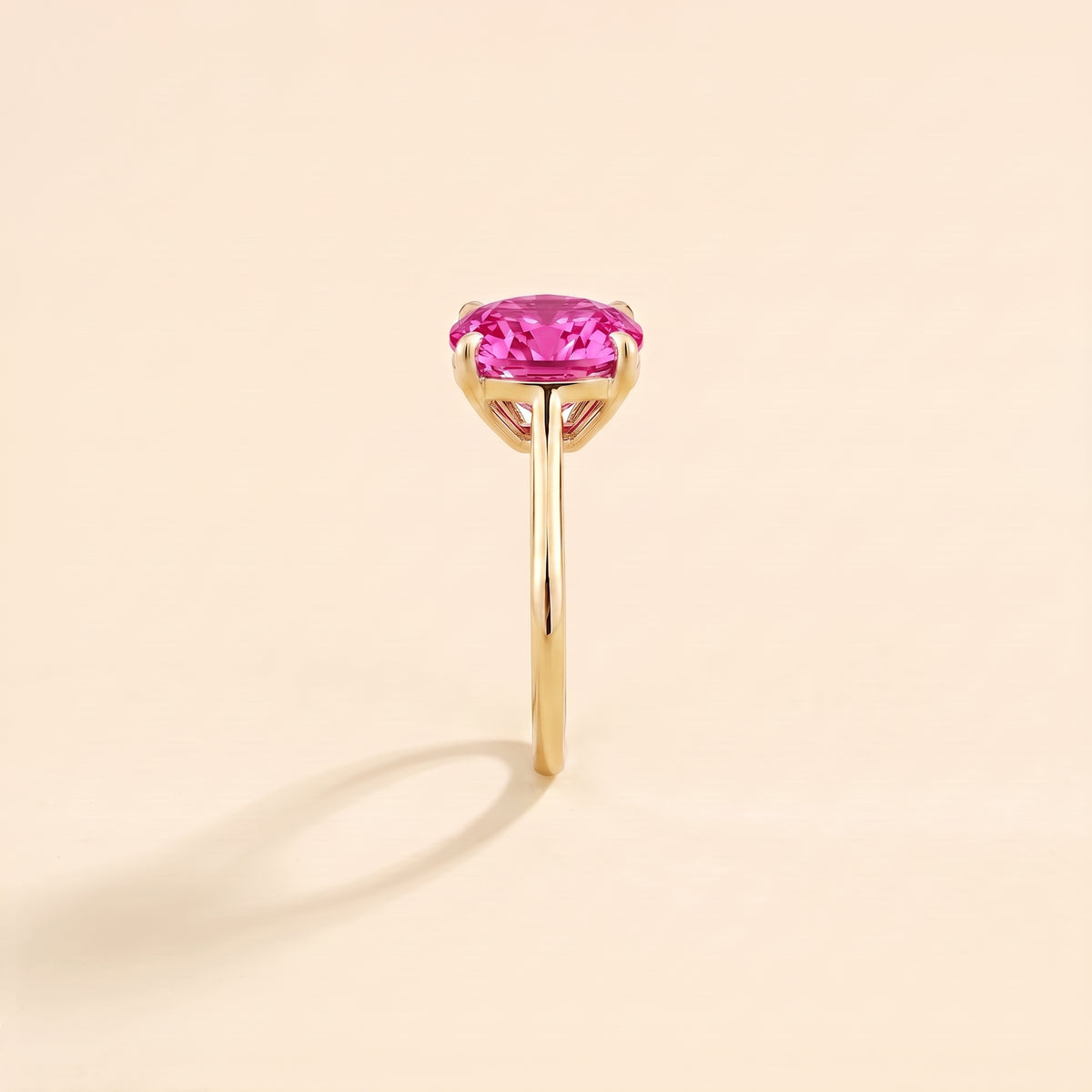 Iris Cushion Shape Vivid Pink Sapphire Cathedral Solitaire Ring side edge