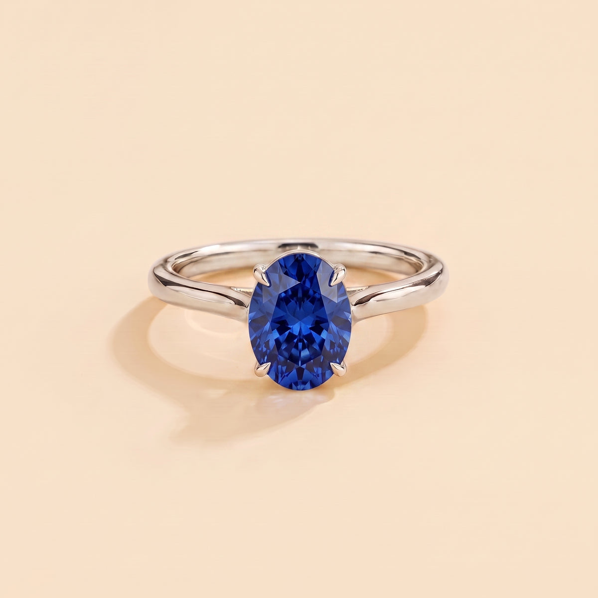 Lyra Oval Shape Blue Sapphire Cathedral Solitaire Ring front