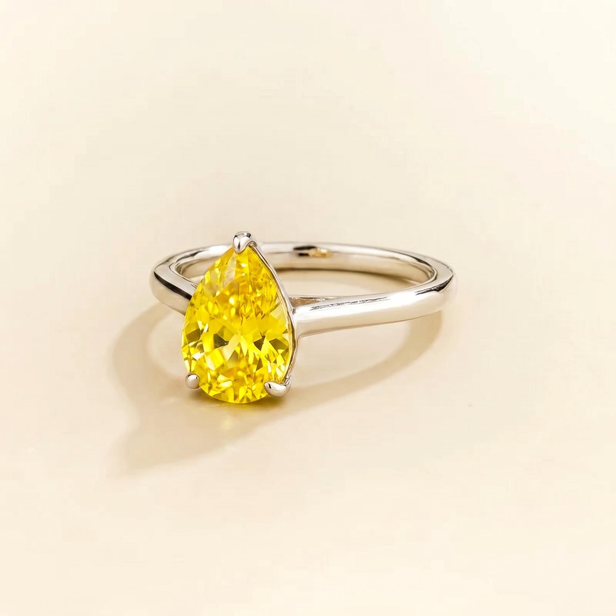 Pandal Pear Shape Yellow Sapphire Cathedral Solitaire Ring in white gold