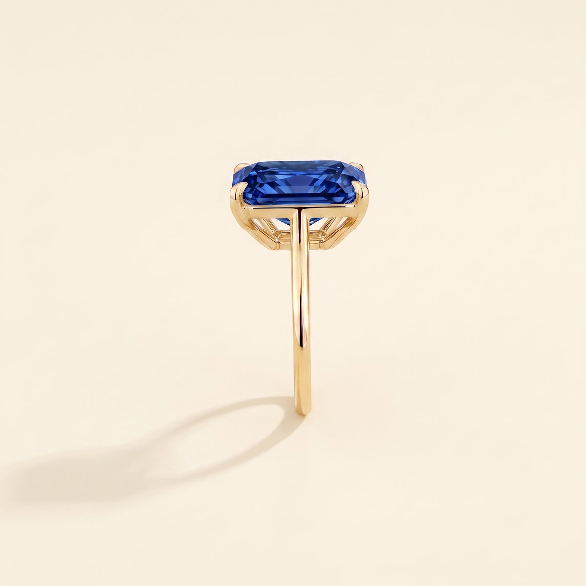 Clair Radiant Shape Blue Sapphire Cathedral Solitaire Ring side edge