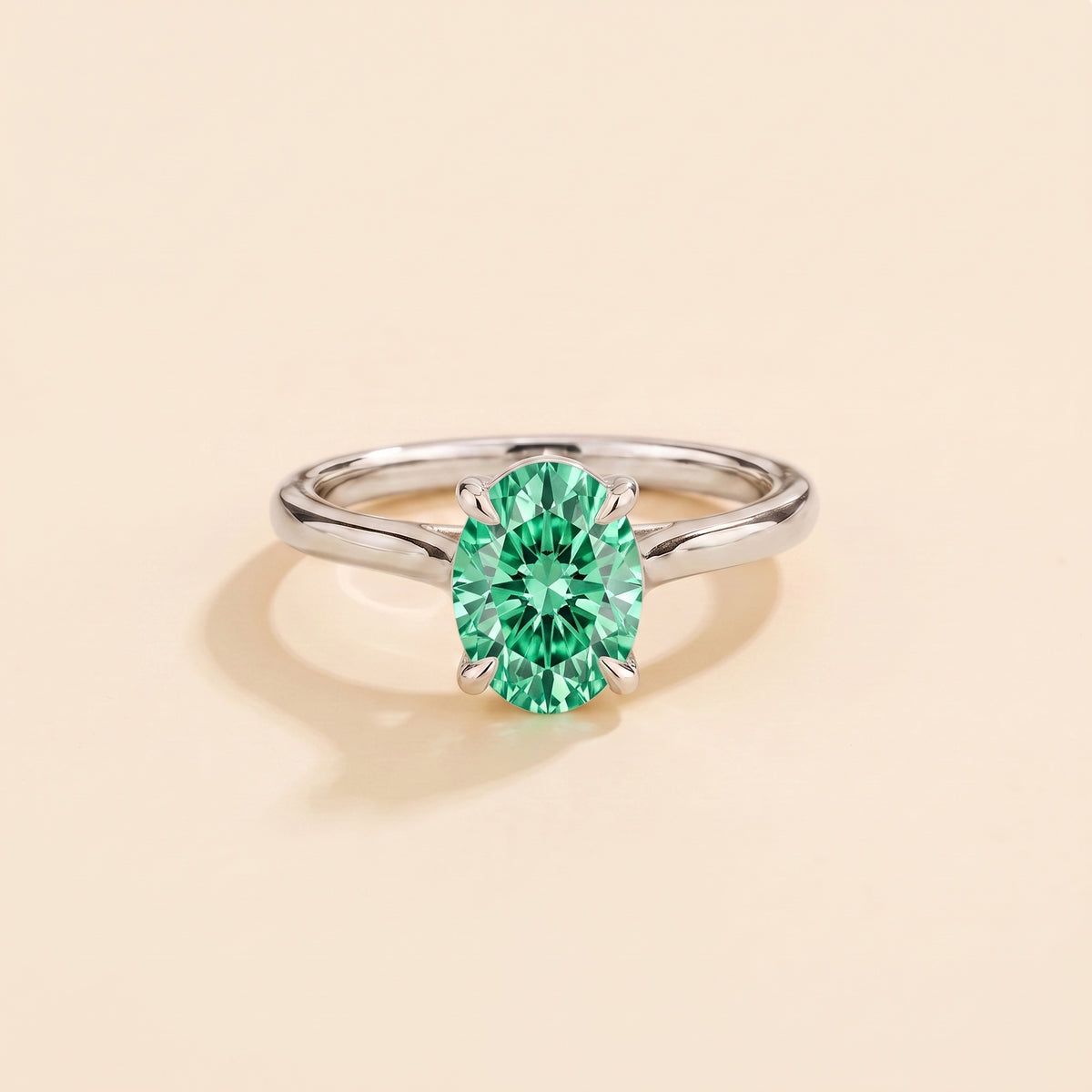 Lyra Oval Shape Green Sapphire Cathedral Solitaire Ring front