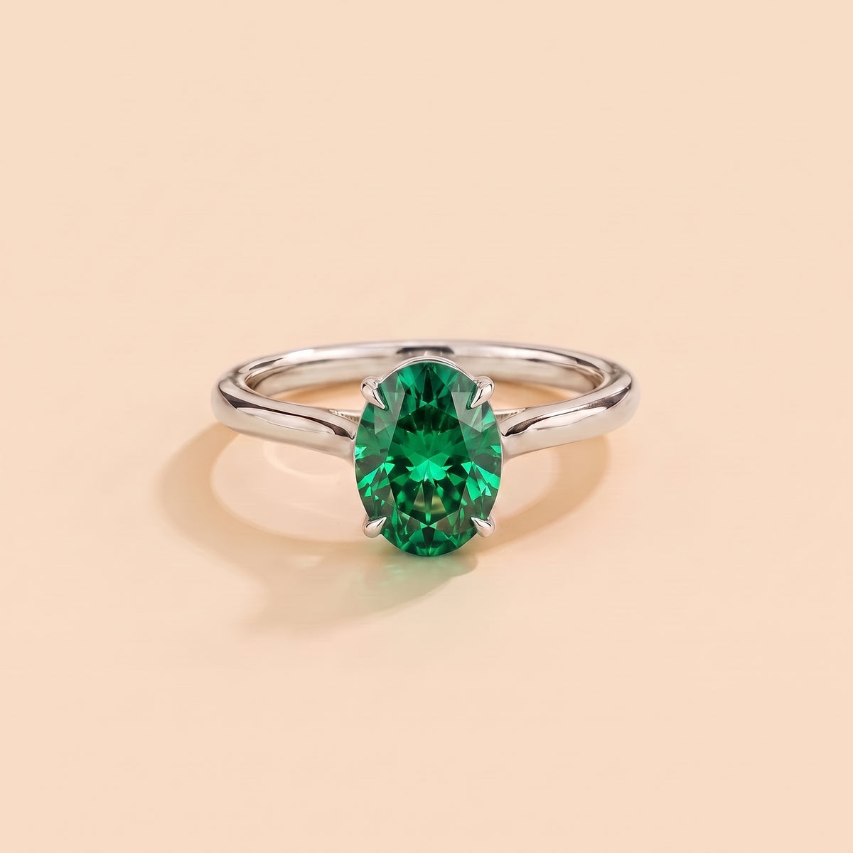 Lyra Oval Shape Emerald Cathedral Solitaire Ring front