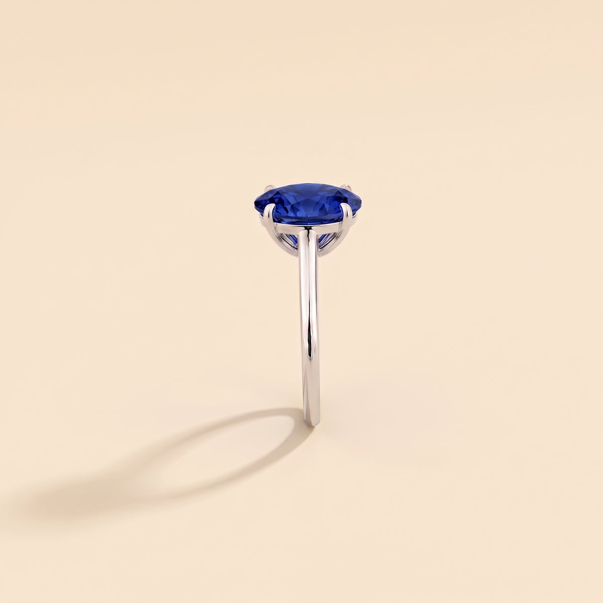 Lyra Oval Shape Blue Sapphire Cathedral Solitaire Ring side edge