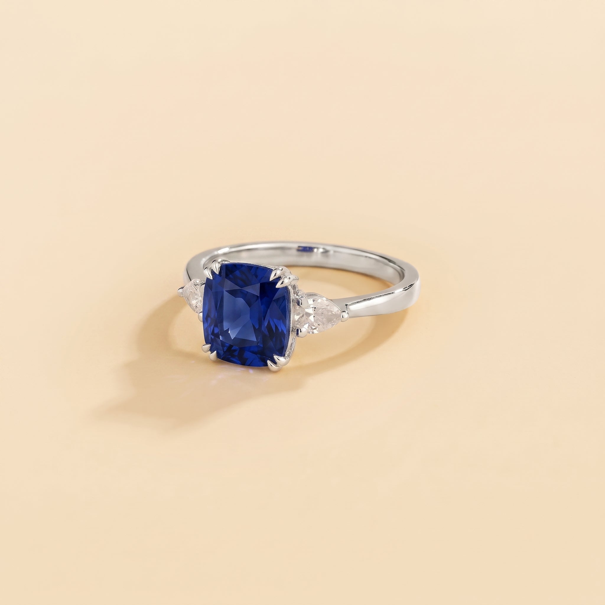 Roue Blue Sapphire Cushion Cut & Diamond Pear Cut White Gold Ring three quarters