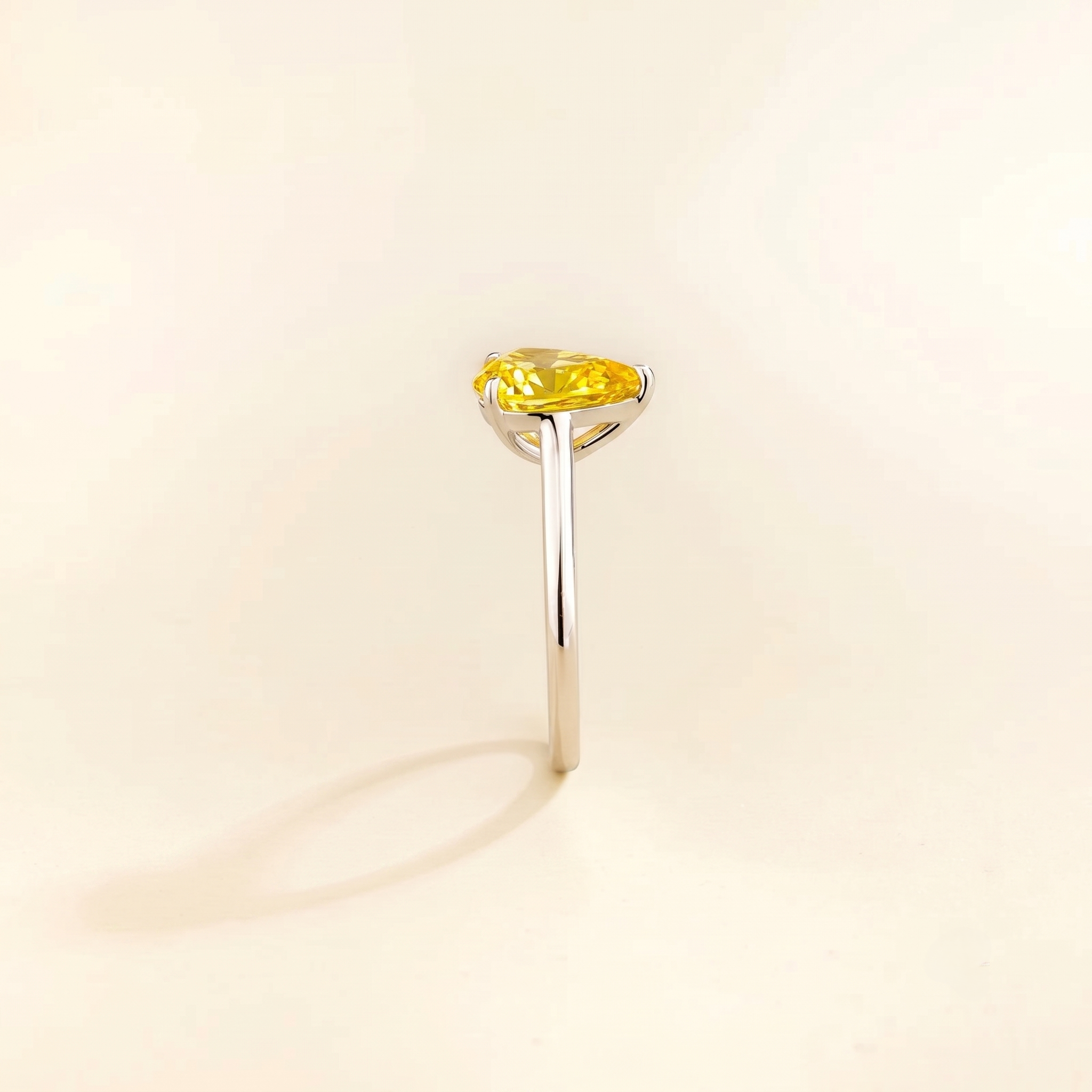 Pandal Pear Shape Yellow Sapphire Cathedral Solitaire Ring in white gold