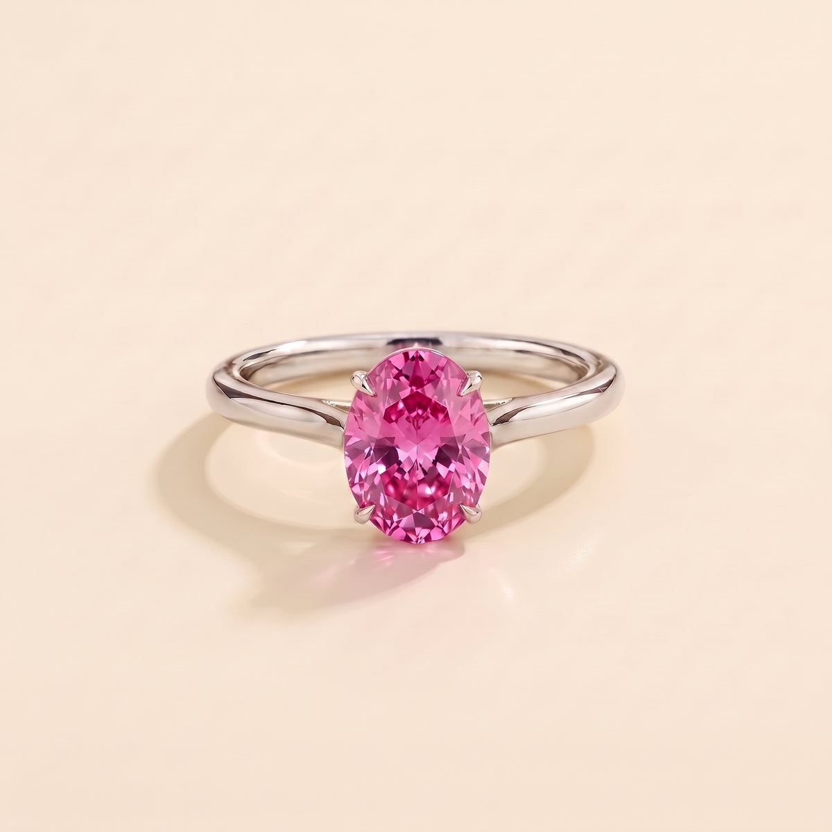 Lyra Oval Shape Vivid Pink Sapphire Cathedral Solitaire Ring front