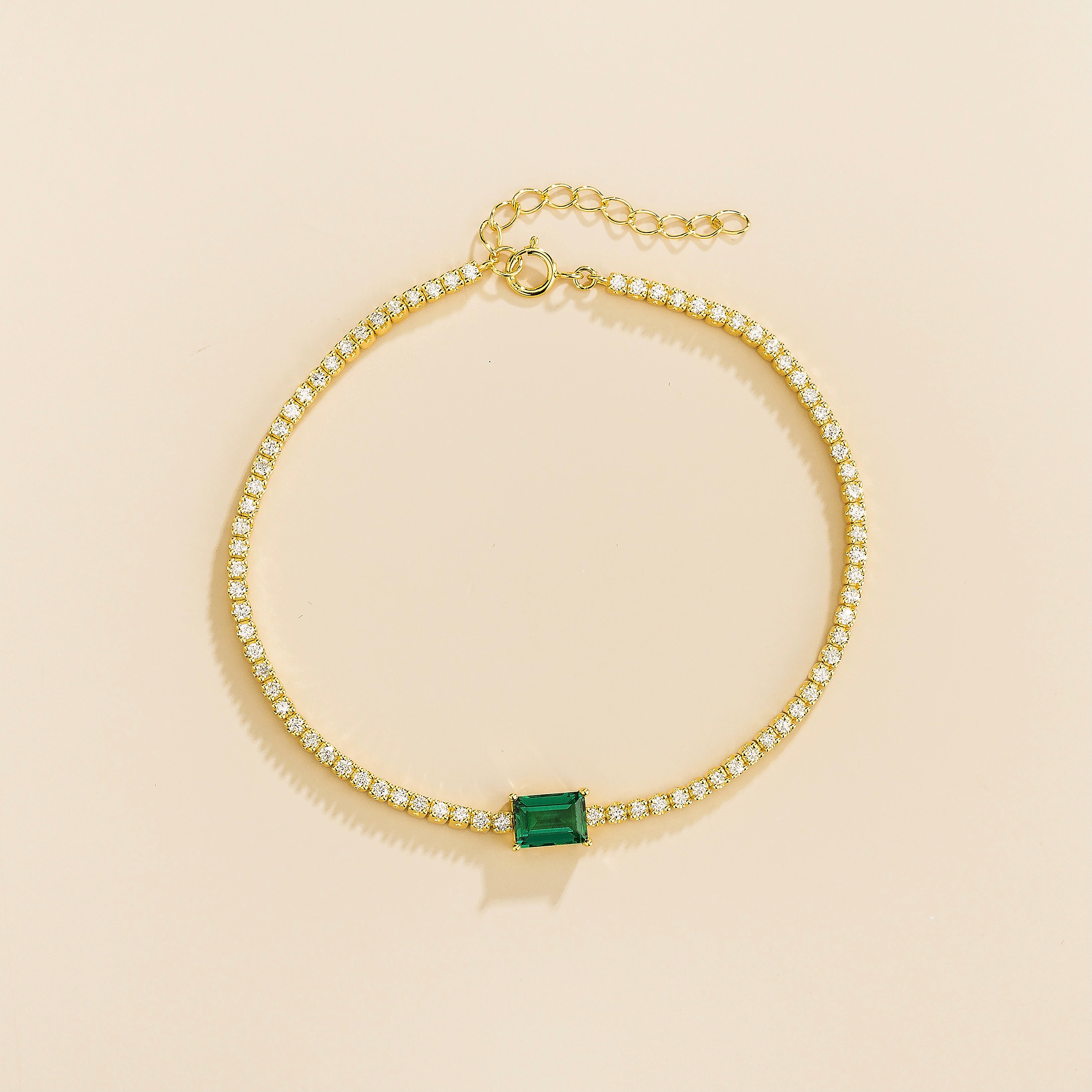 emerald cut gemstone bracelet in gold with sustainable lab grown diamonds