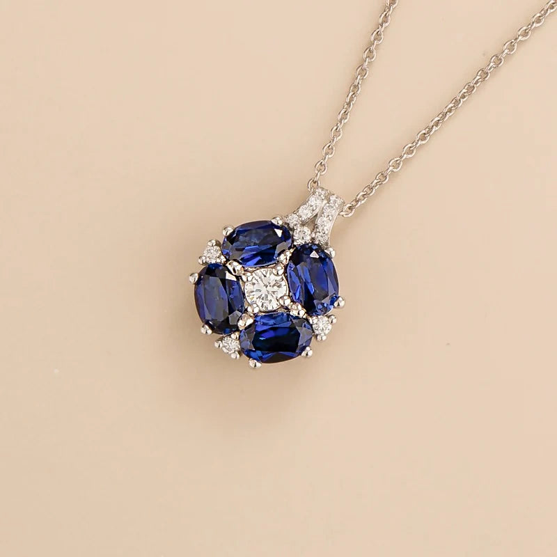 Pristi Oval Blue Sapphire & Diamond Cluster Pendant in White Gold