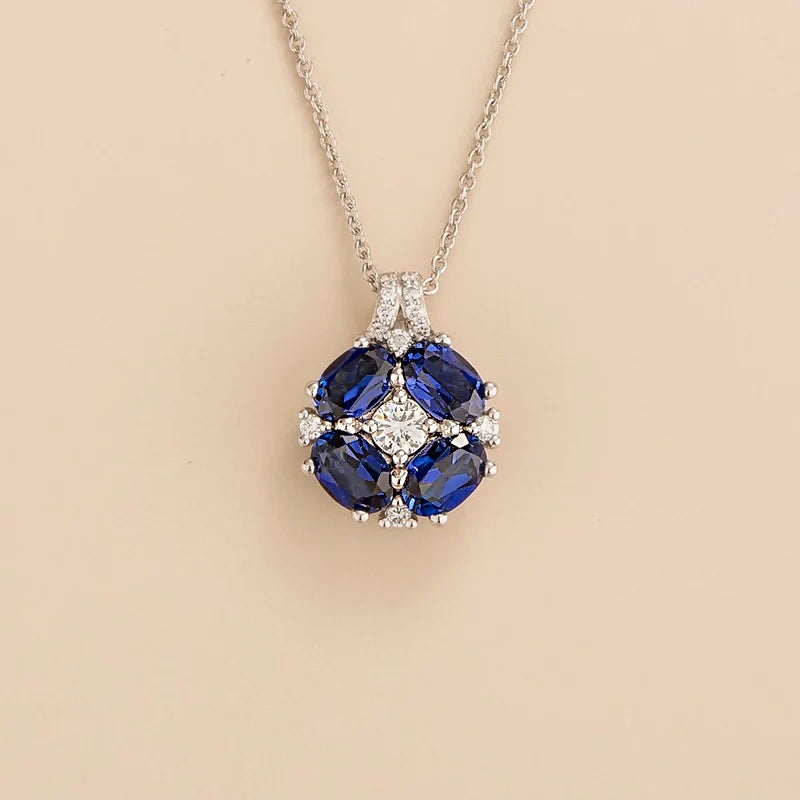 Pristi Oval Blue Sapphire & Diamond Cluster Pendant in White Gold