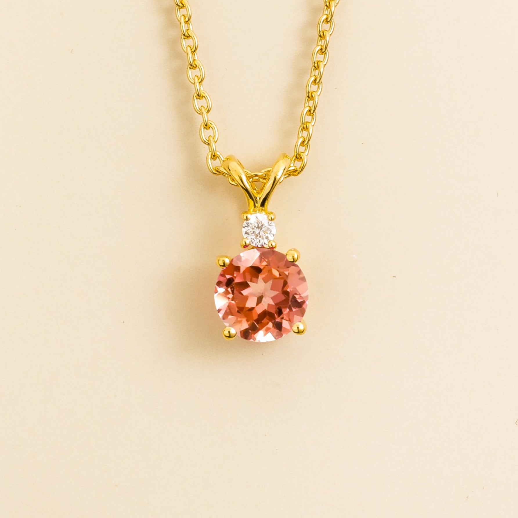 necklace in Padparadscha sapphire and diamond set in gold