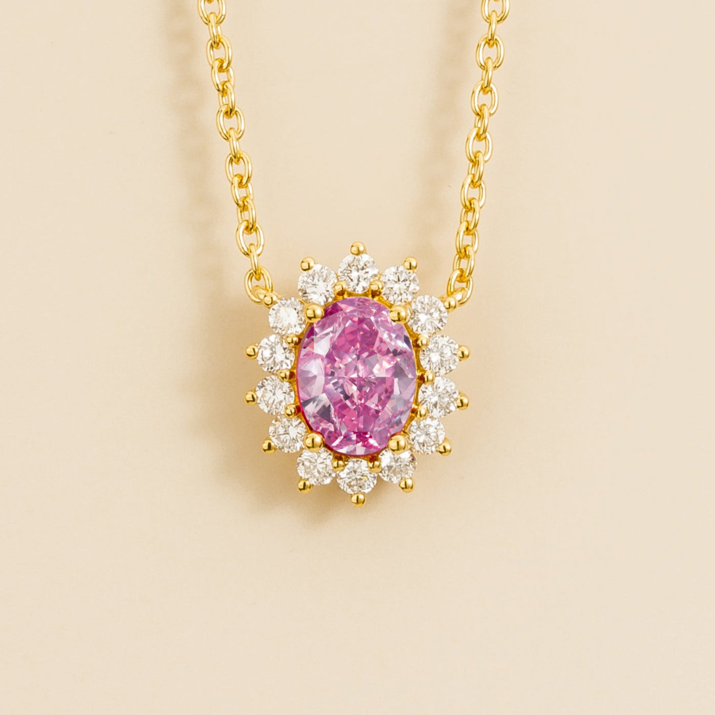 Gold necklace from Juvetti called divo set in pink sapphire and diamonds.