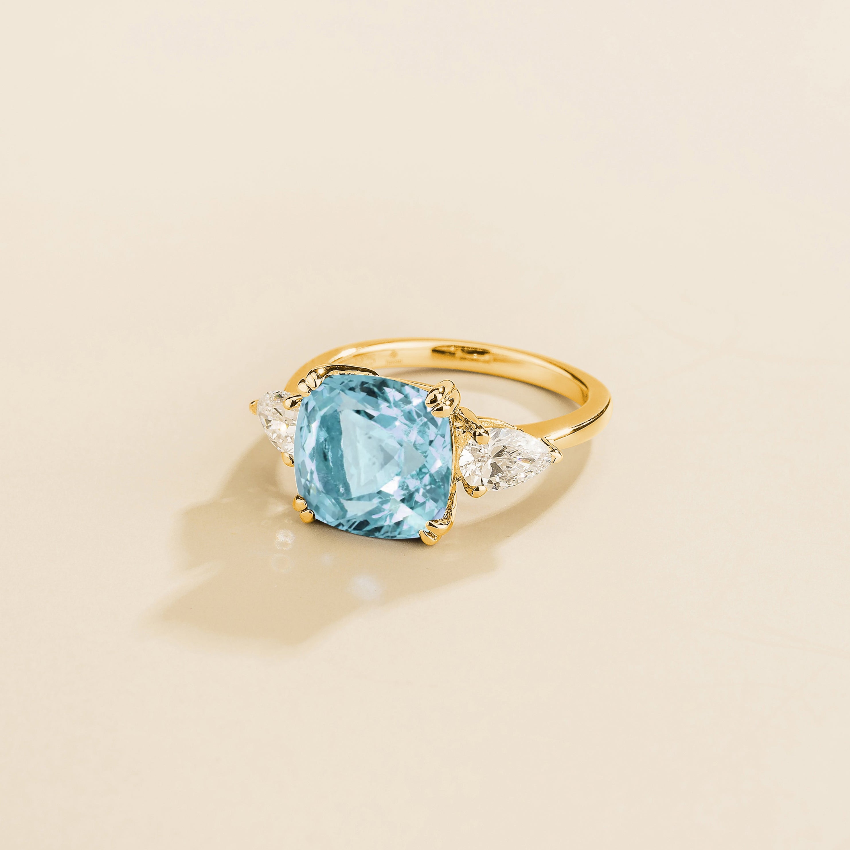 Pari ring in gold set with Paraiba Sapphire and Diamonds.