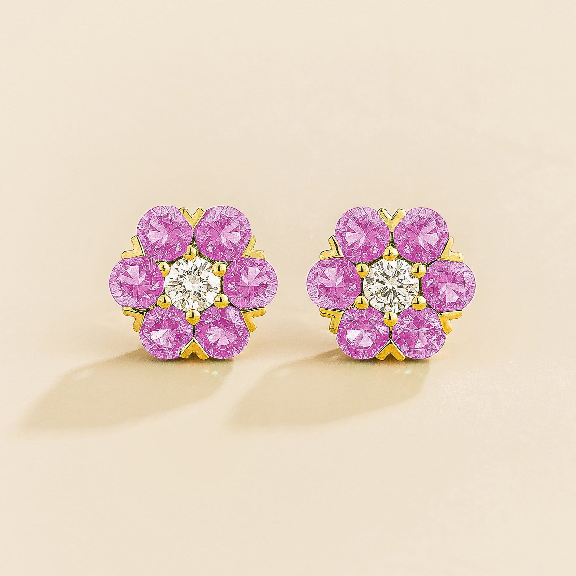 Cinq earrings in gold set with Diamonds and Pink Sapphires.