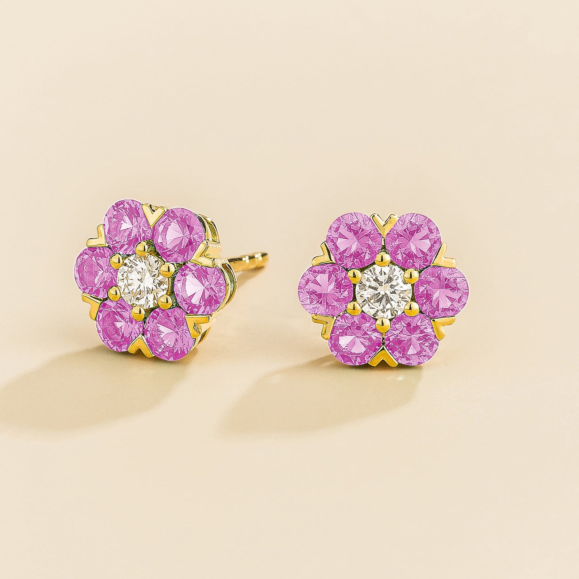 Cinq earrings in gold set with Diamonds and Pink Sapphires.