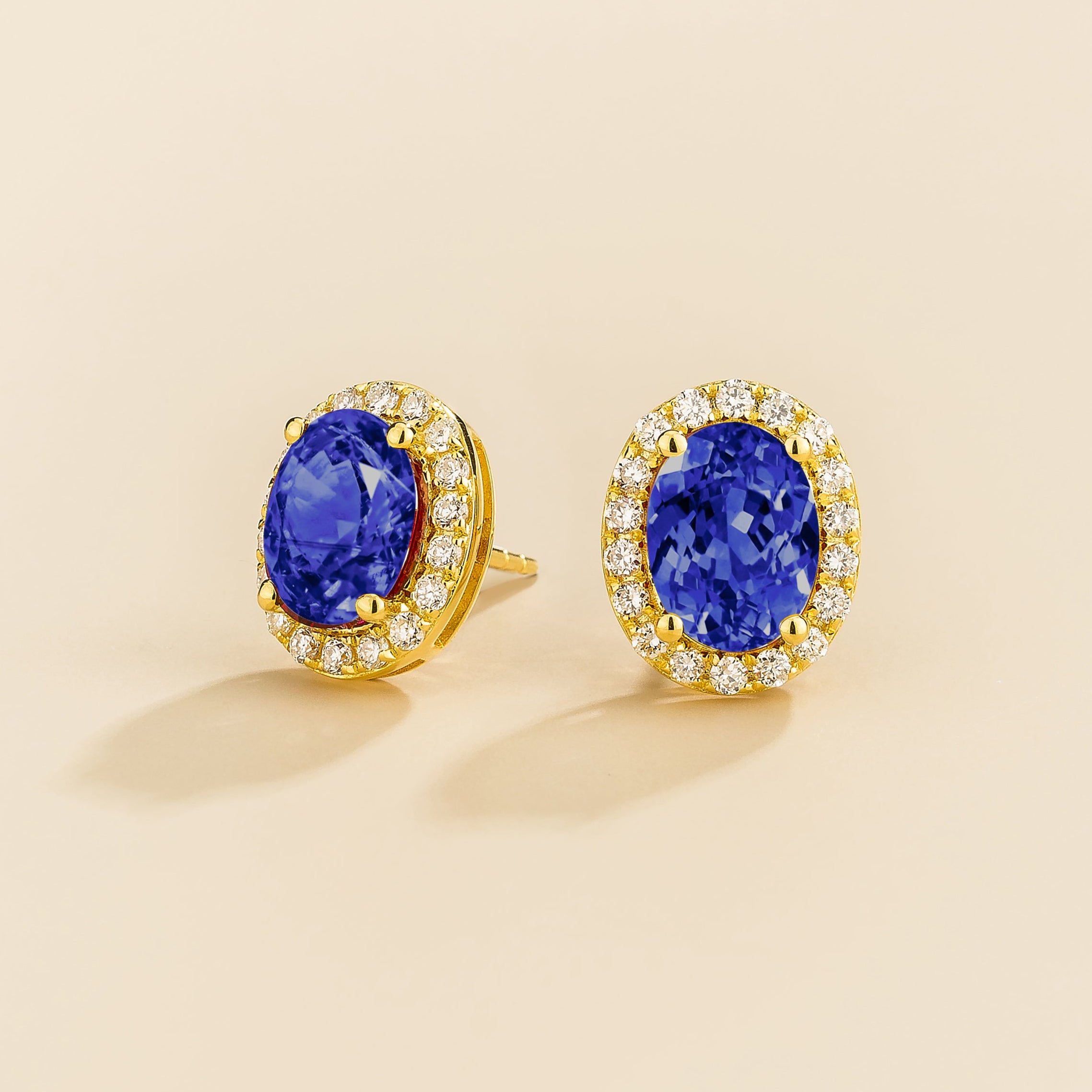 Mina gold earrings in Blue Sapphire and diamonds.