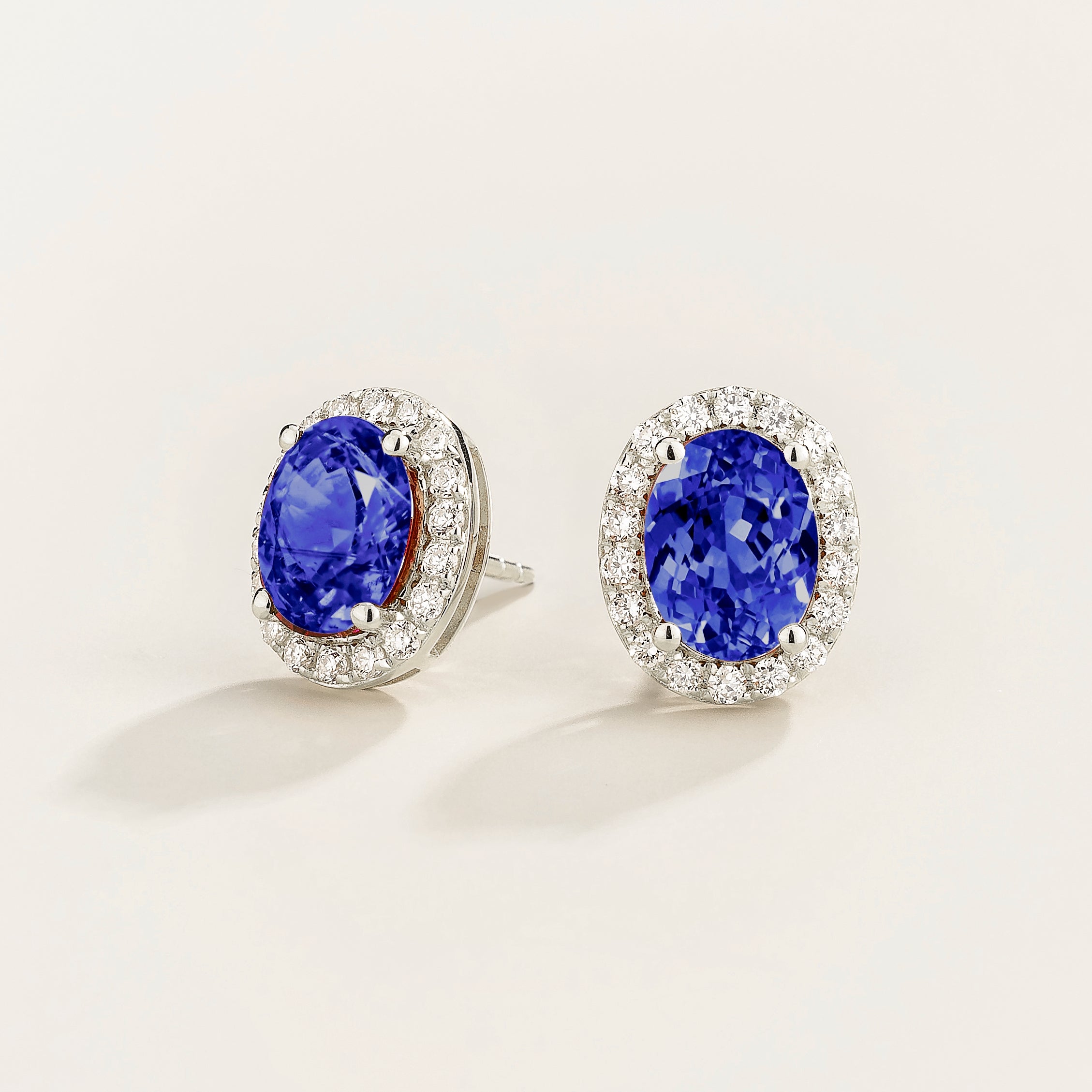 Mina Oval Blue Sapphire & Diamond Halo Earrings In White Gold