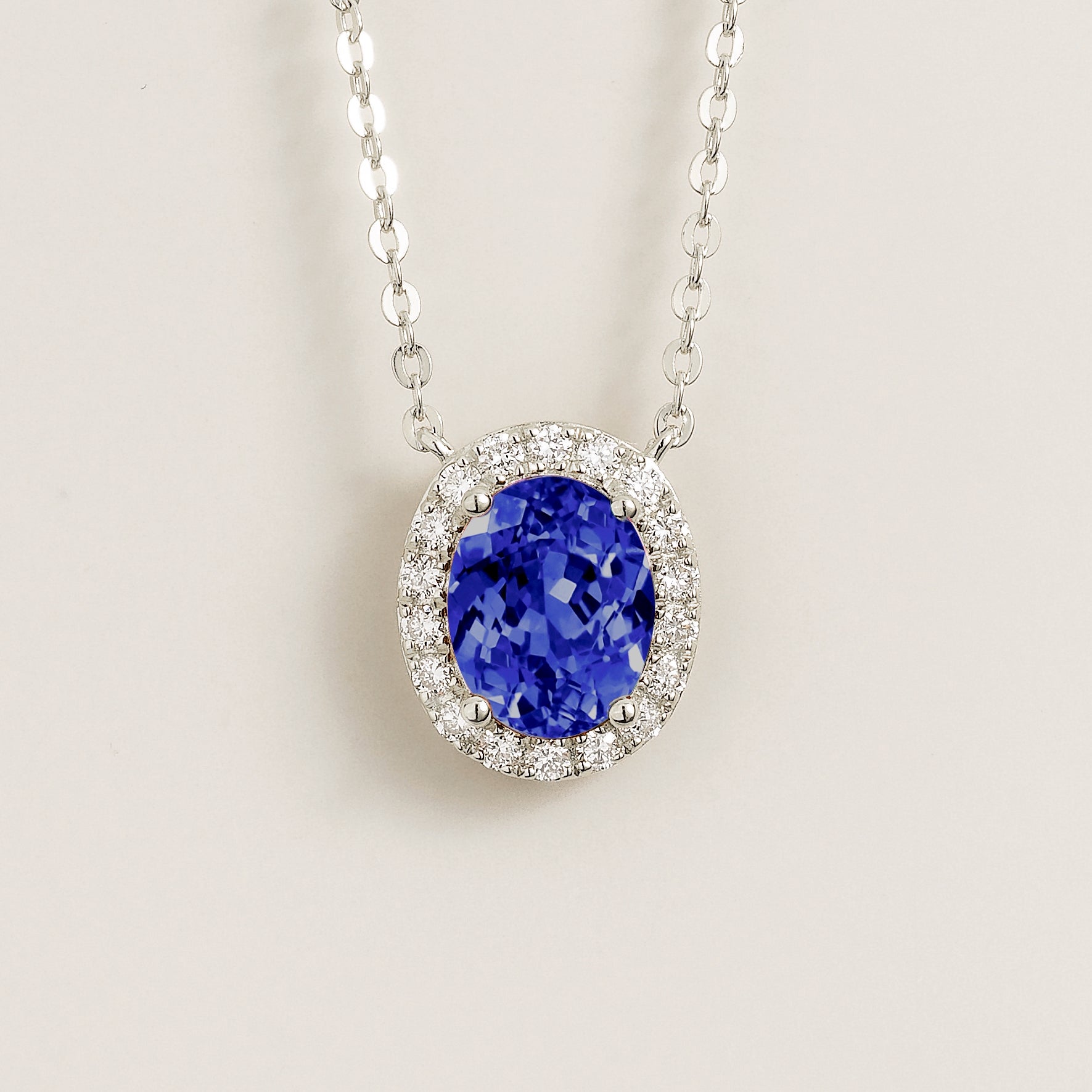 Mina Oval Blue Sapphire & Diamond Halo Necklace In White Gold