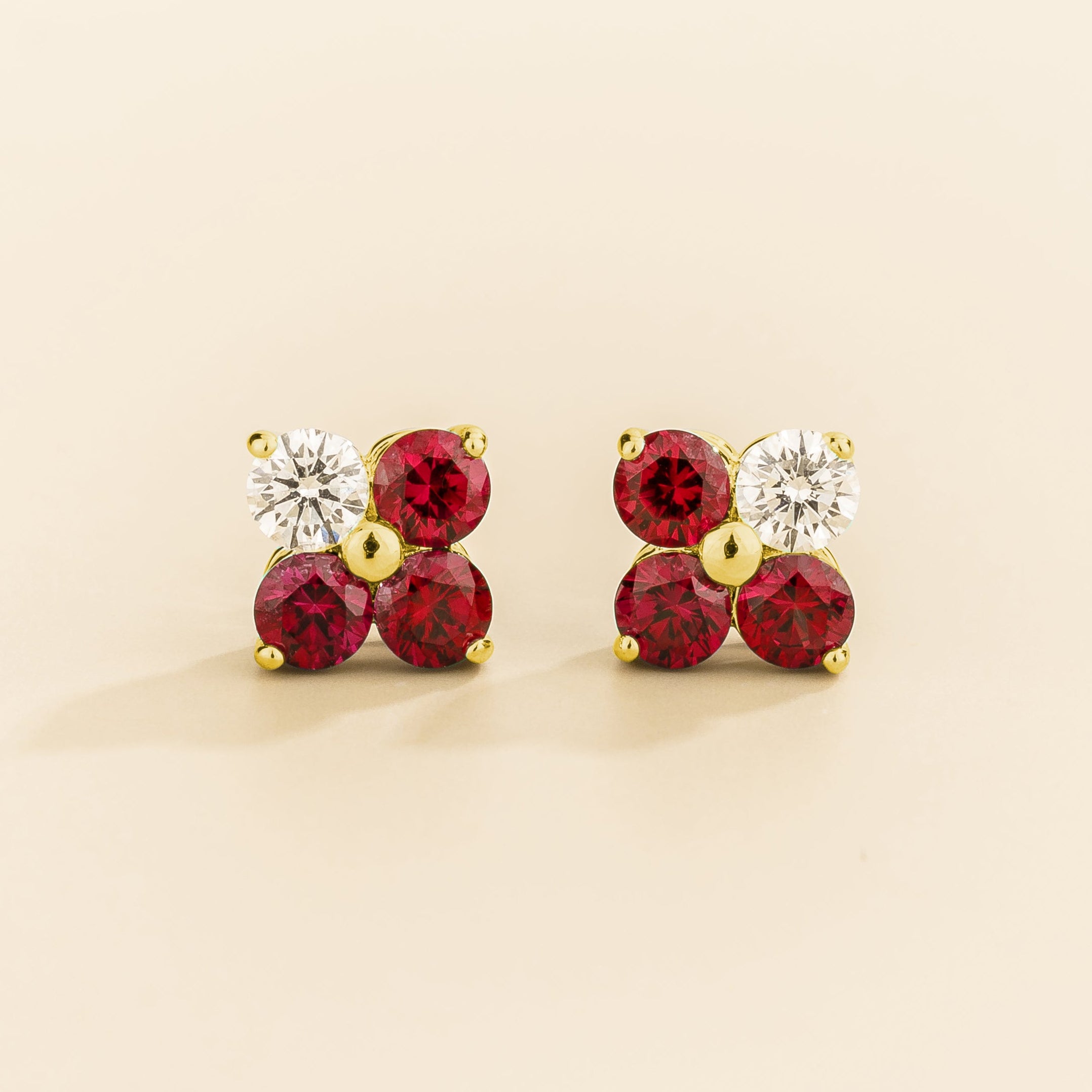 Petale 4-gemstones stud earrings in gold set with ~0.7 carats of ruby and ~0.2 Diamonds