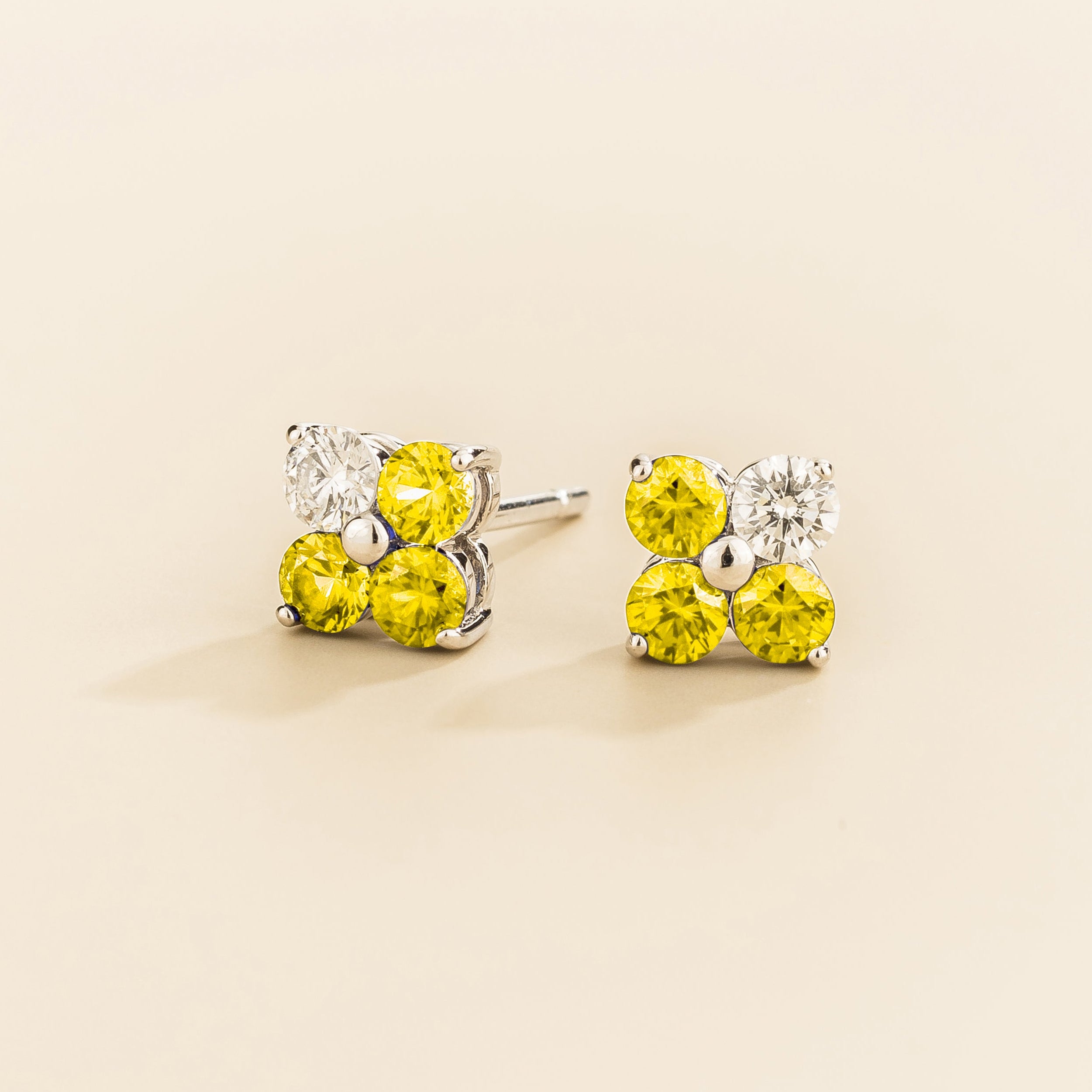 Pair of 4 gemstones yellow sapphire and diamond earrings in white gold