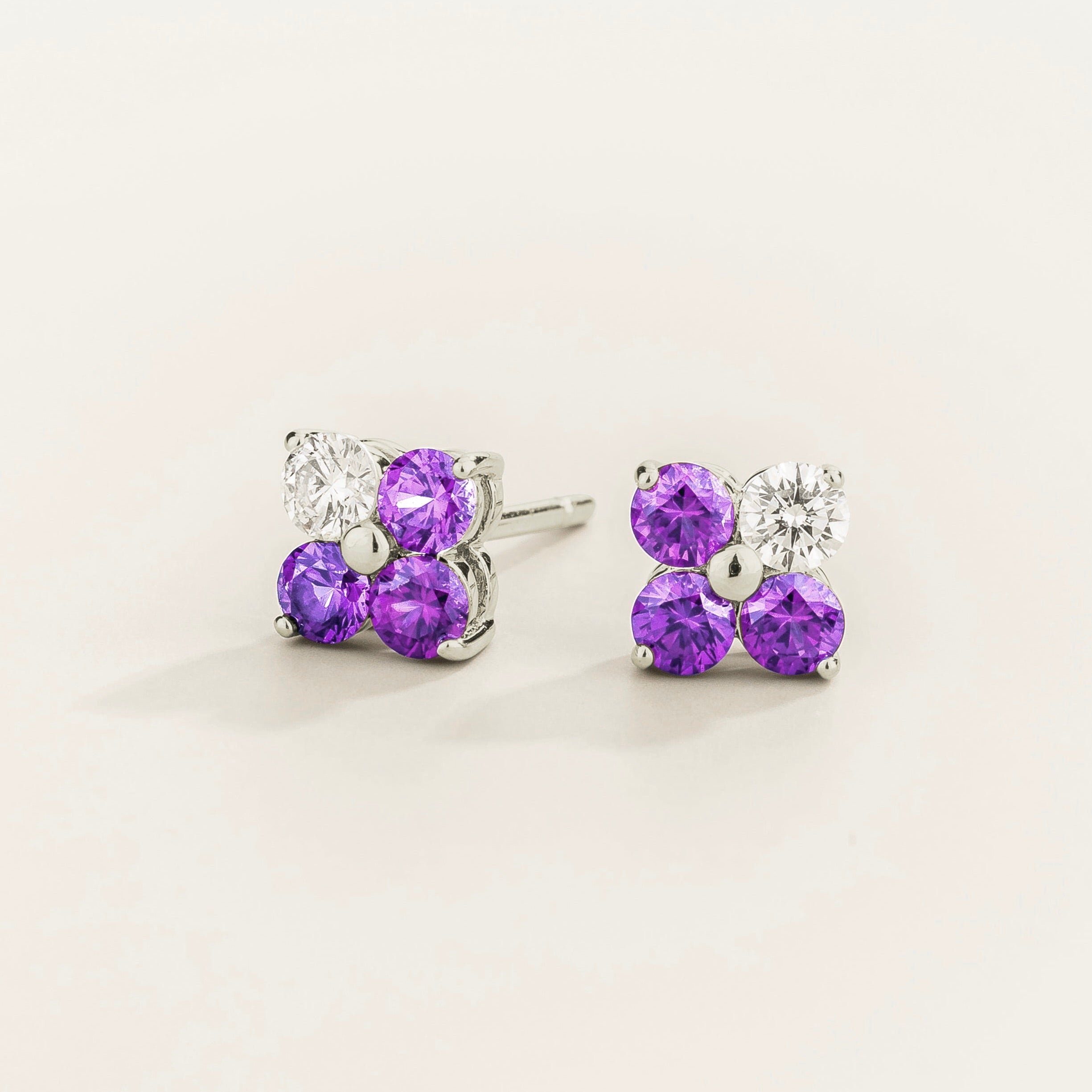 Petale 4-gemstones stud earrings in white gold set with ~0.7 carats purple sapphires and ~0.2 Diamonds