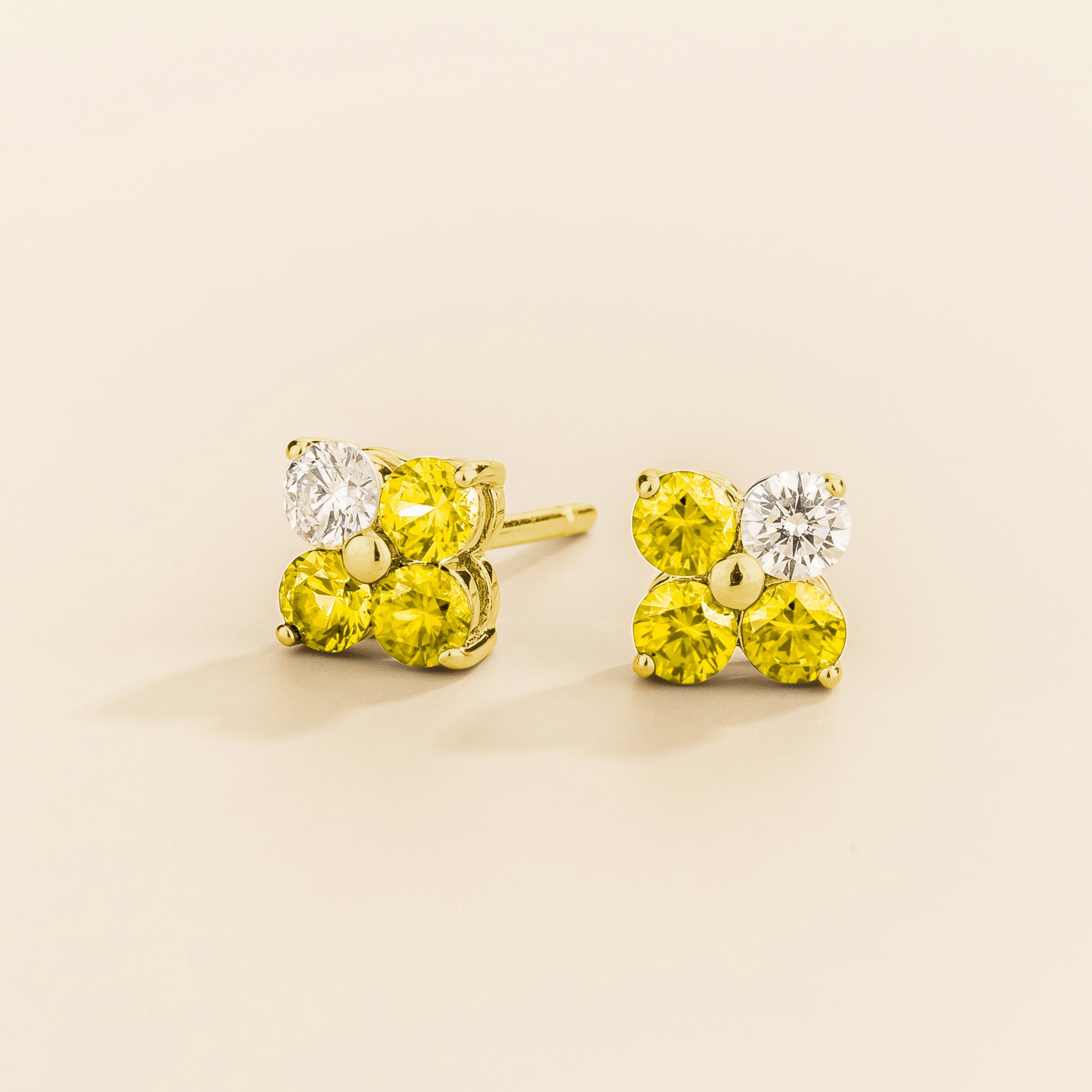 Pair of 4 gemstones yellow sapphire and diamond earrings in gold