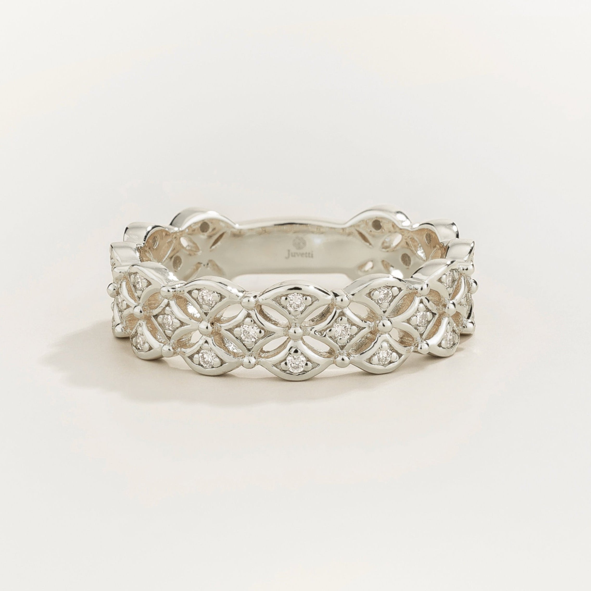 Juvetti white gold floral-pattern band set with lab-grown round diamonds.