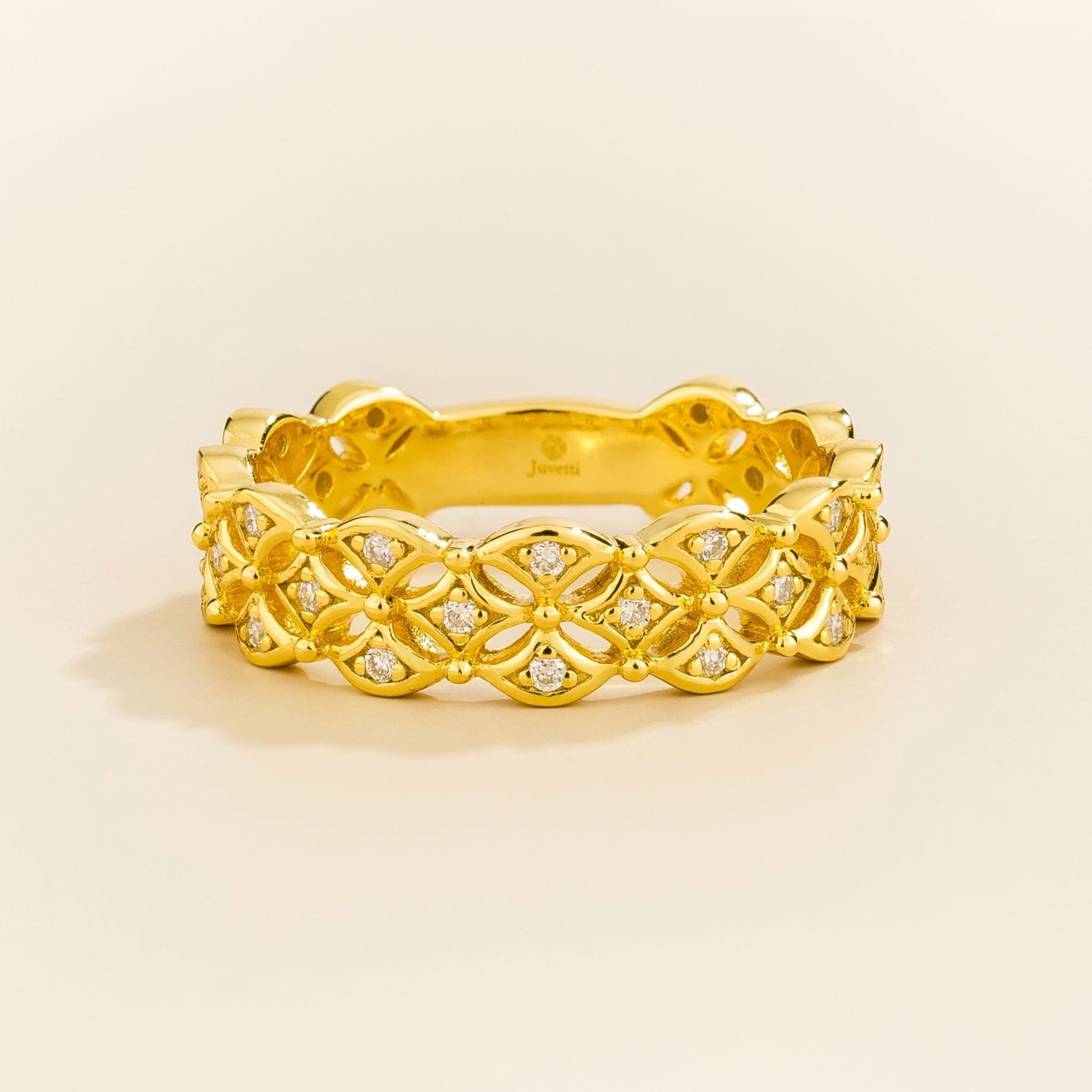 Juvetti yellow gold floral-pattern band set with lab-grown round diamonds.