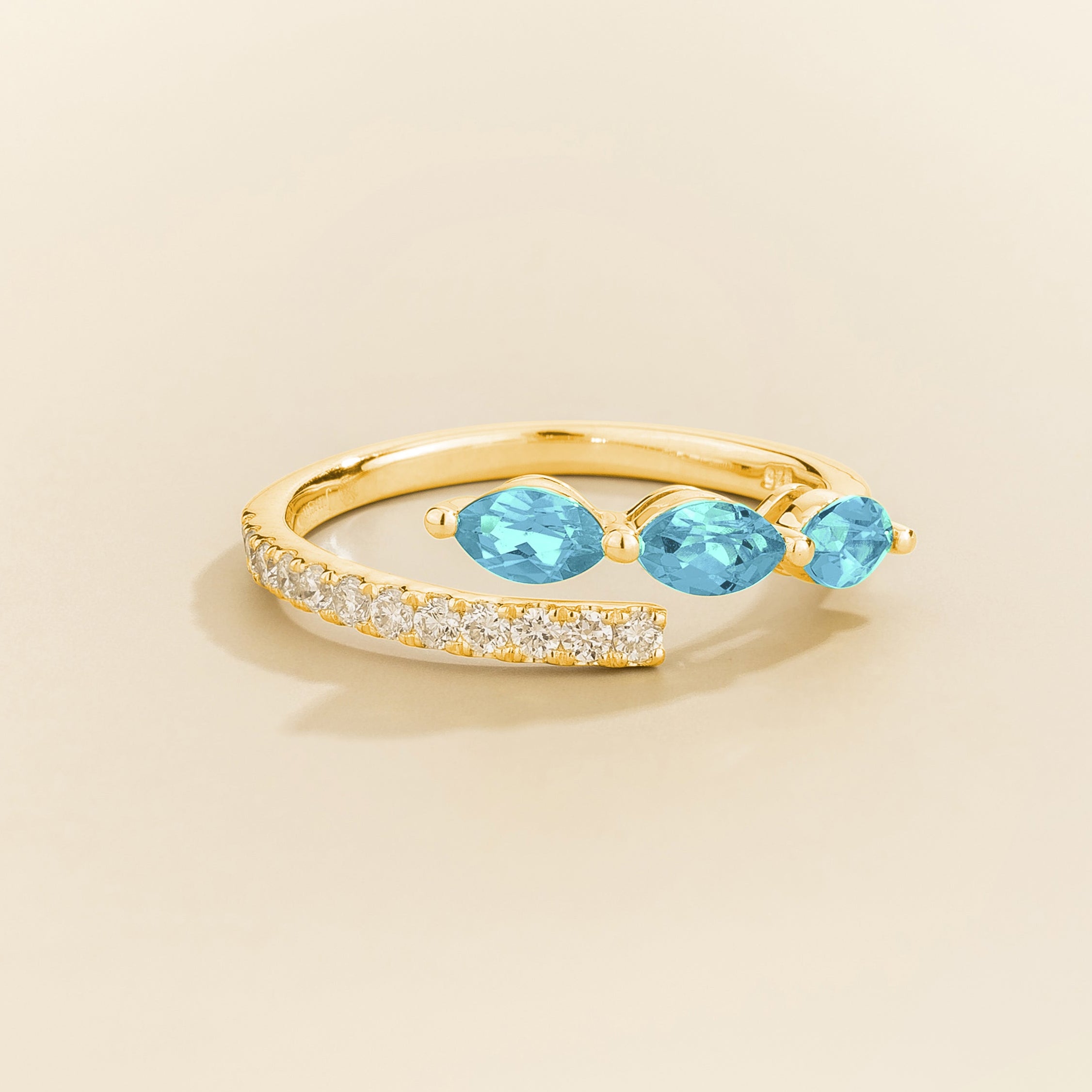 Sava ring in gold set with Aquamarine and Diamonds.