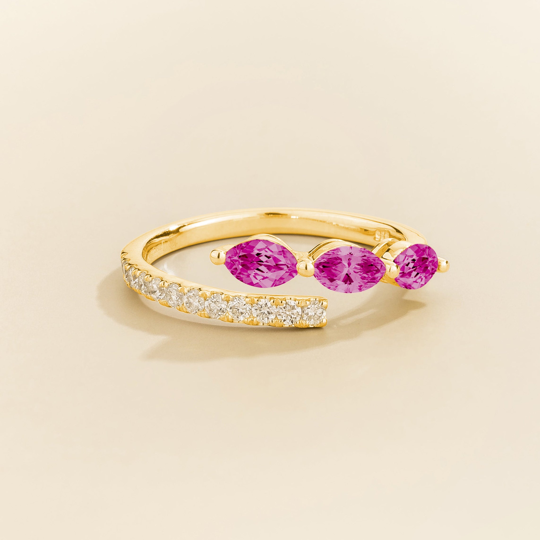 Juvetti gold open band ring featuring marquise cut lab-grown dark pink sapphires and pavé-set lab-grown diamonds.