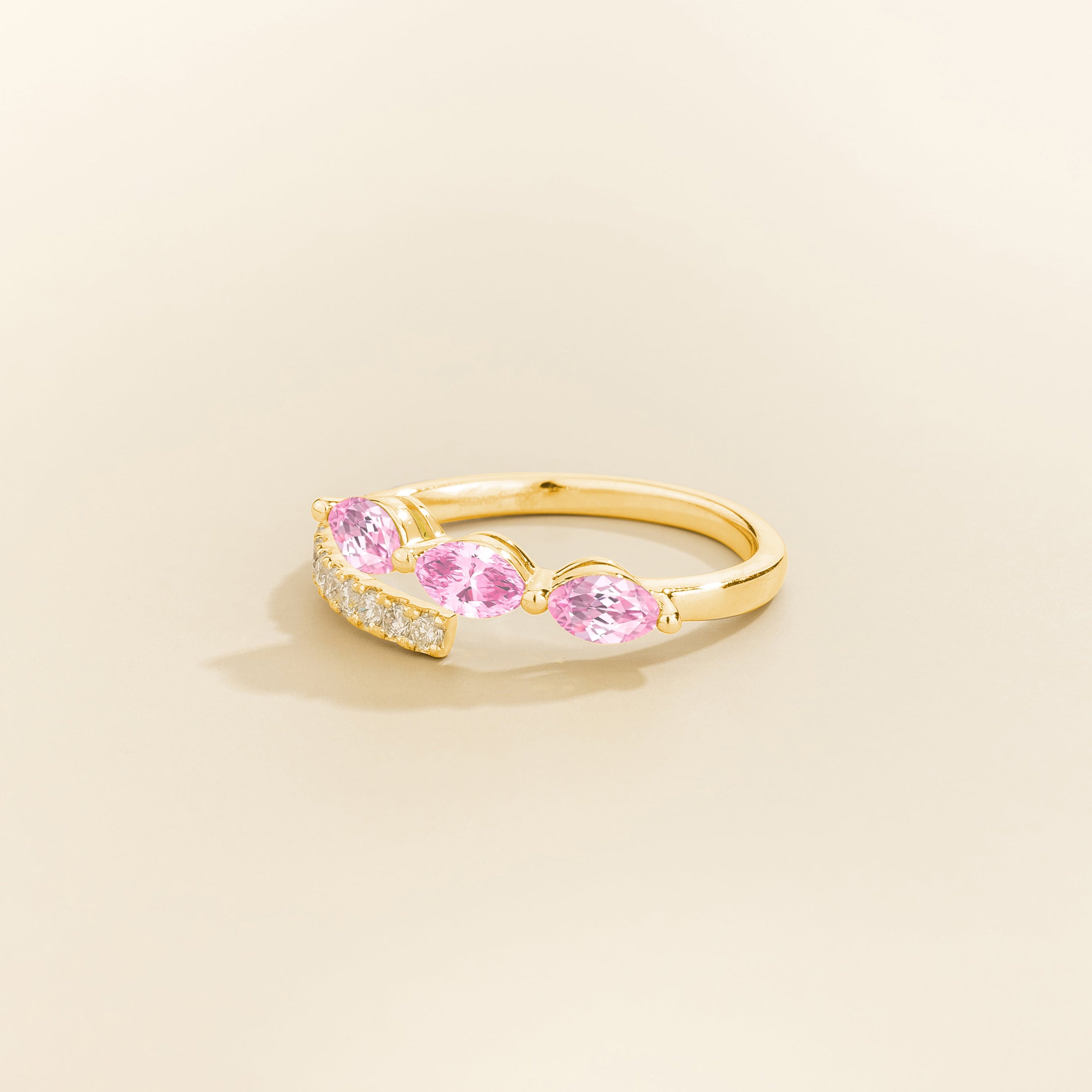 Sava ring in gold set with light pink Sapphire and Diamonds.