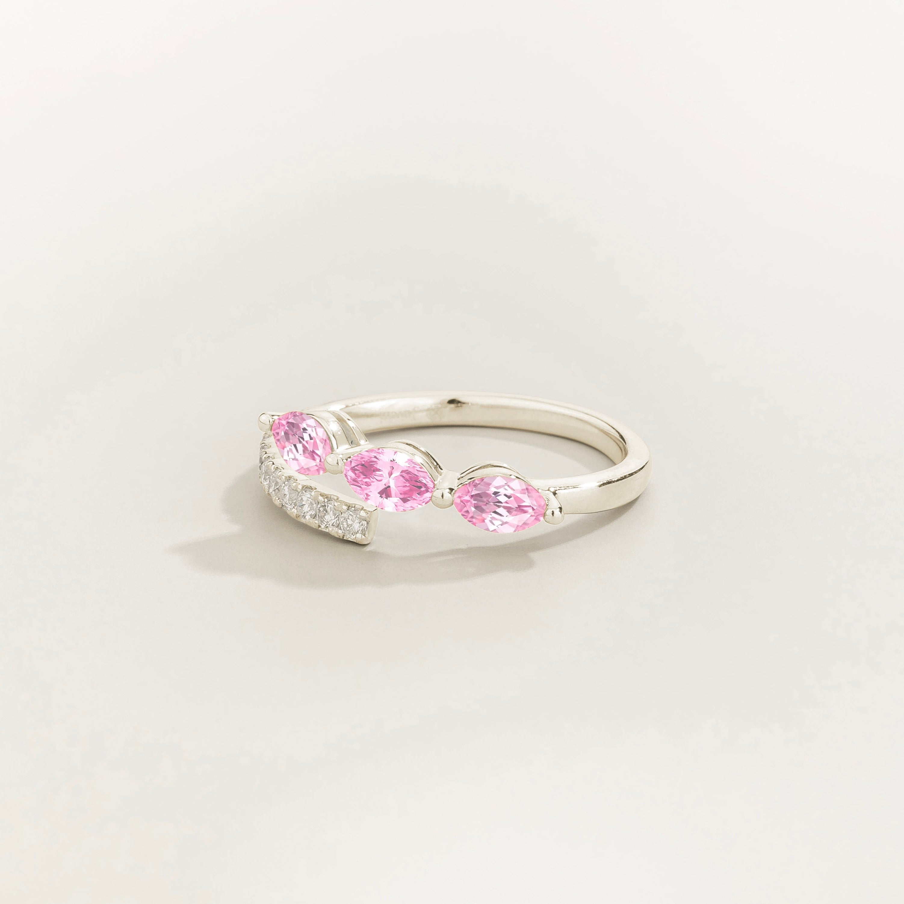 Sava ring in white gold set with light pink Sapphire and Diamonds.