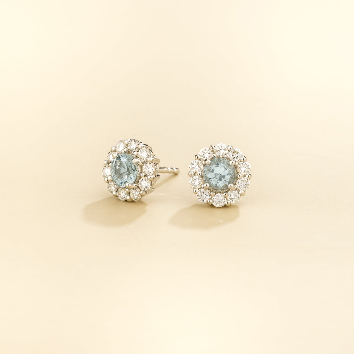 Talia Round Aquamarine & Diamond Halo Stud Earrings three quarters