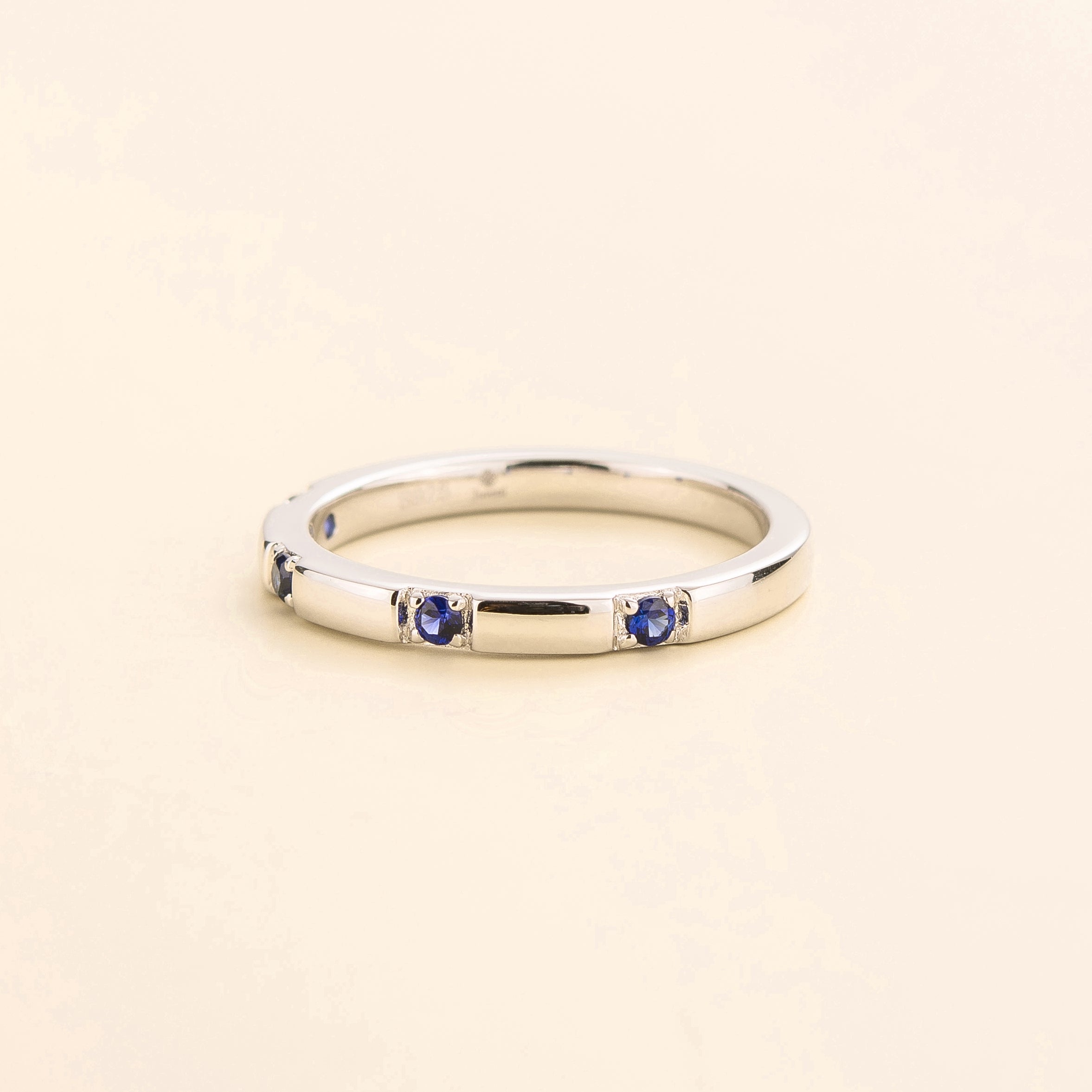 Balans Blue Sapphire Station Band Ring In White Gold