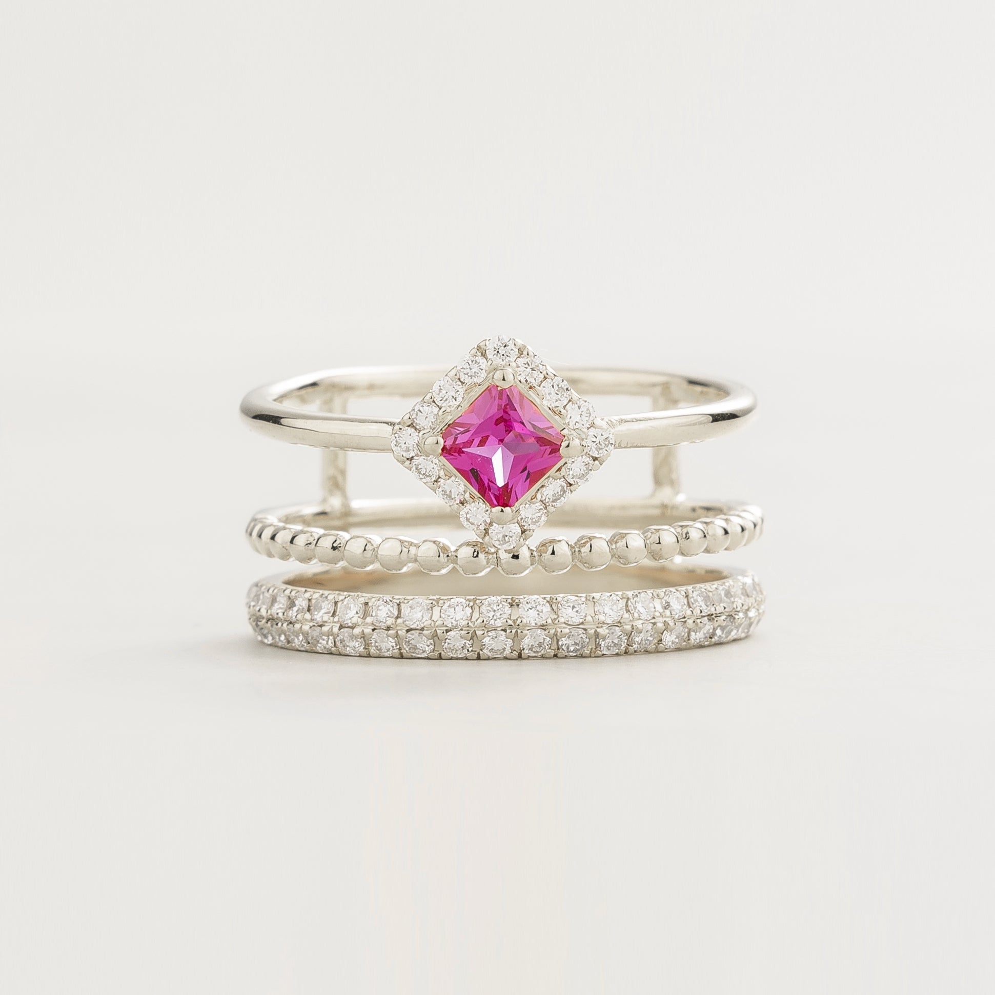 Amici White Gold Stacking Ring In Princess Cut Pink Sapphire and Round Diamond Pavé By Juvetti Online Jewellery London